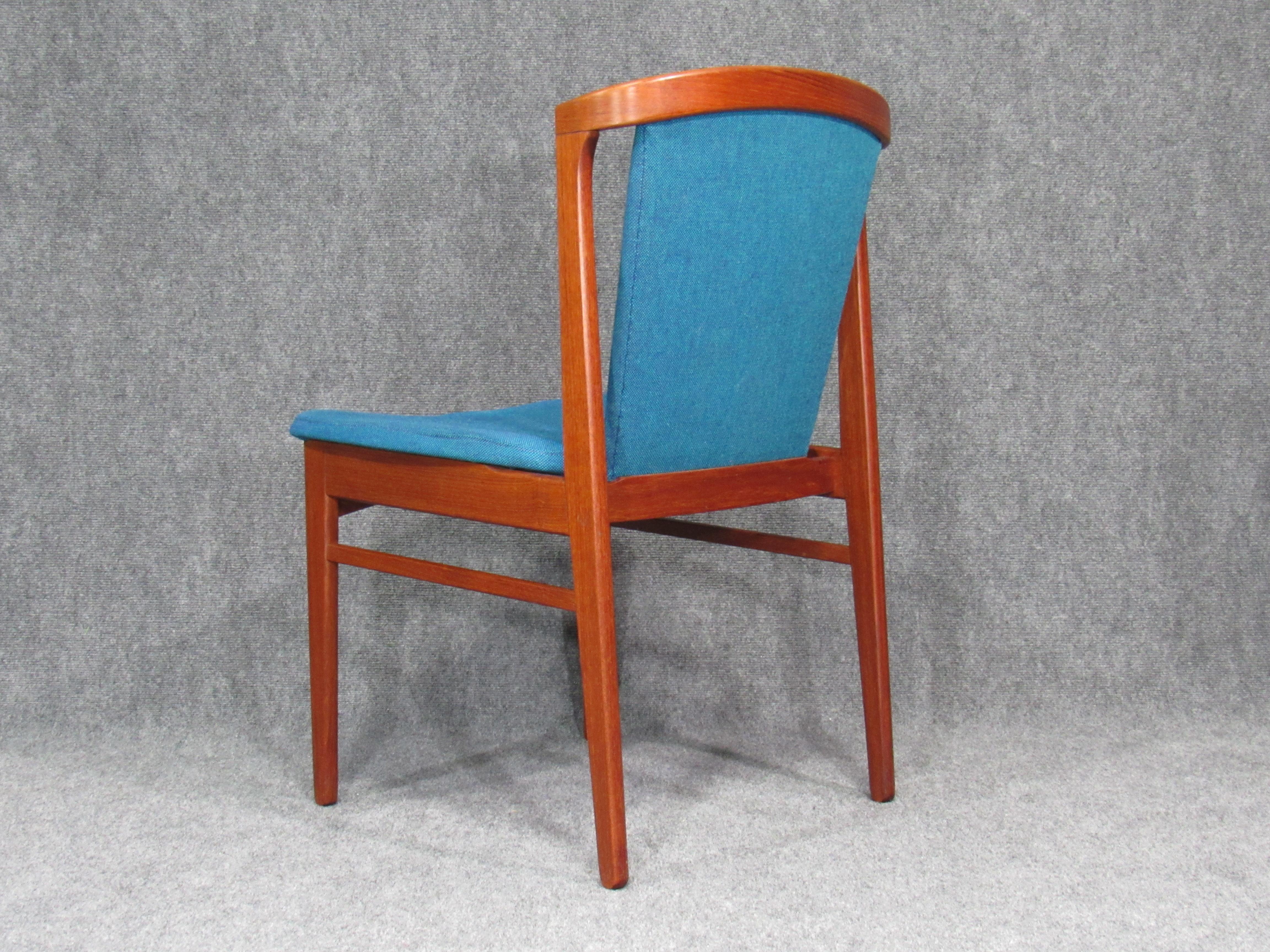 This set of six rare midcentury, Danish modern teak dining chairs by Erik Buck for Chr. Christiansen will be the focal point of any dining or eating area. These chairs are an extraordinary example of Erik Buch's design prowess as well as Chr.