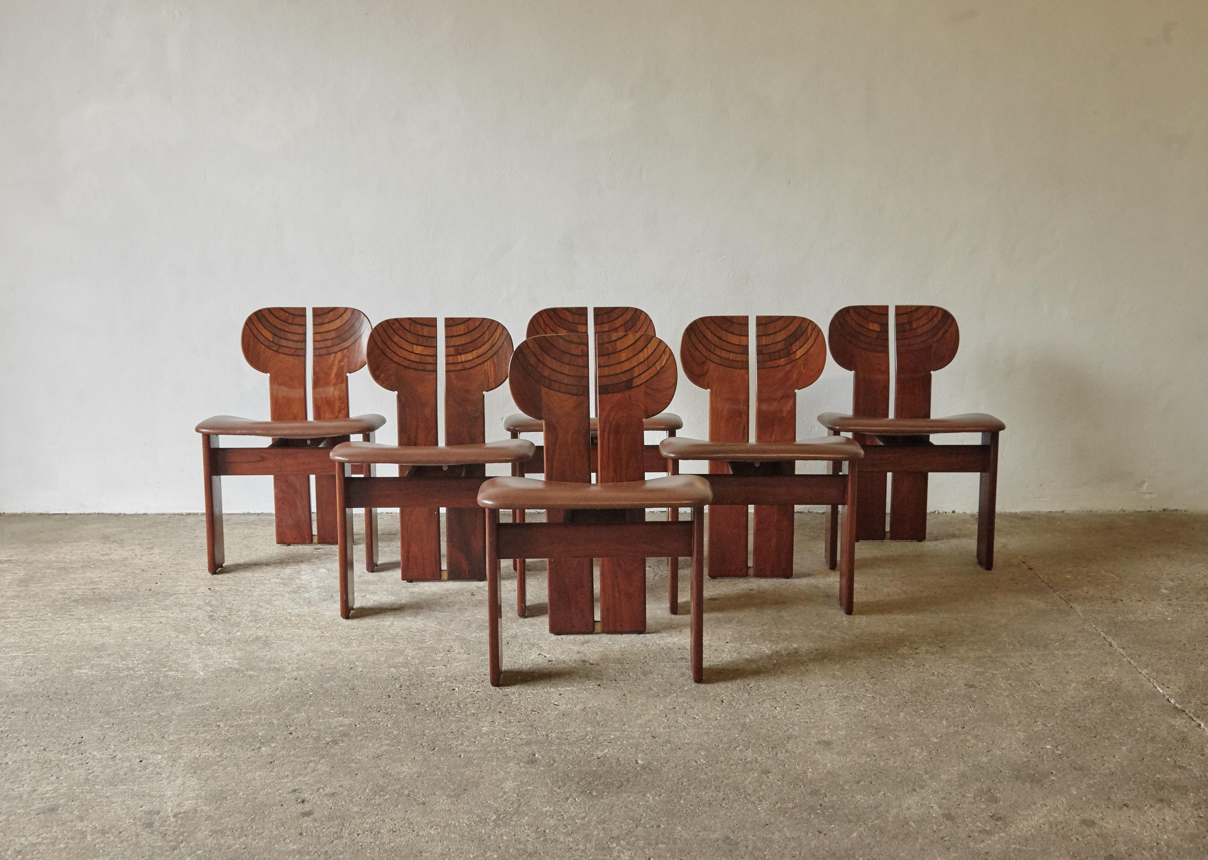 A rare set of six stunning Africa chairs designed by Afra & Tobia Scarpa in the 1970s, and produced by Maxalto, Italy. These are great examples in rare exotic hardwood, burl, black leather and brass. Very good original condition with normal minor