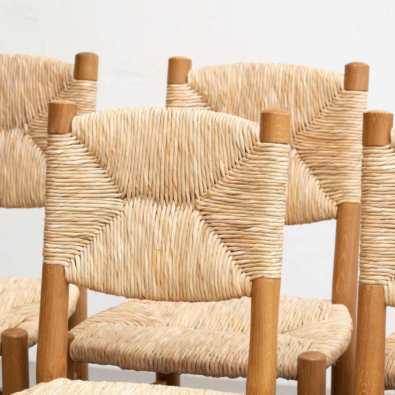 Français Ensemble de six chaises N.19 d'après Charlotte Perriand, en rotin de bois, mi-siècle moderne en vente