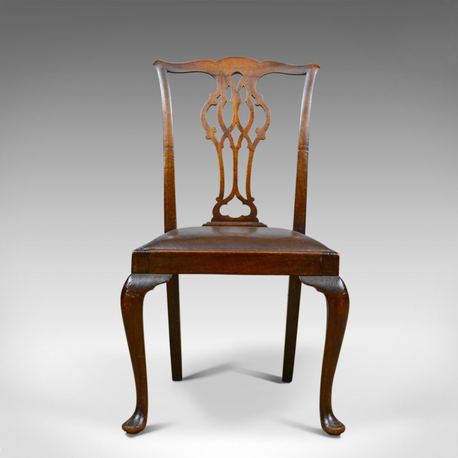 This is a set of six antique dining chairs. English, Victorian, Chippendale revival in mahogany and leather and dating to the turn of the 20th century, circa 1900.

An attractive set of six, English, Chippendale revival dining chairs
In good