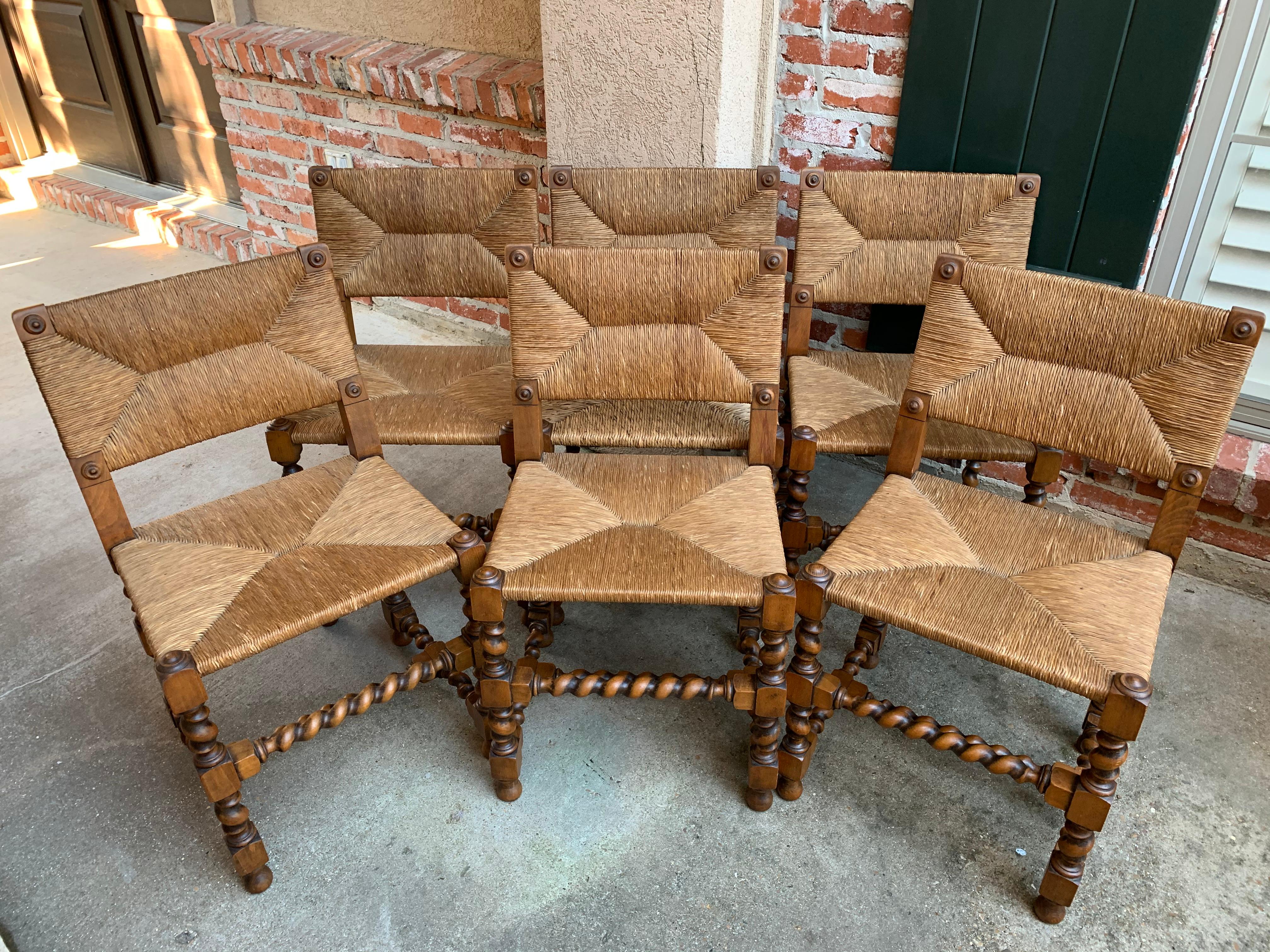 Direct from England, a lovely set of 6 antique English oak dining or side chairs!~
~Gorgeous barley twist on all the legs and on both the cross-stretchers and side stretchers ! (Only superior quality English chairs have the barley twist