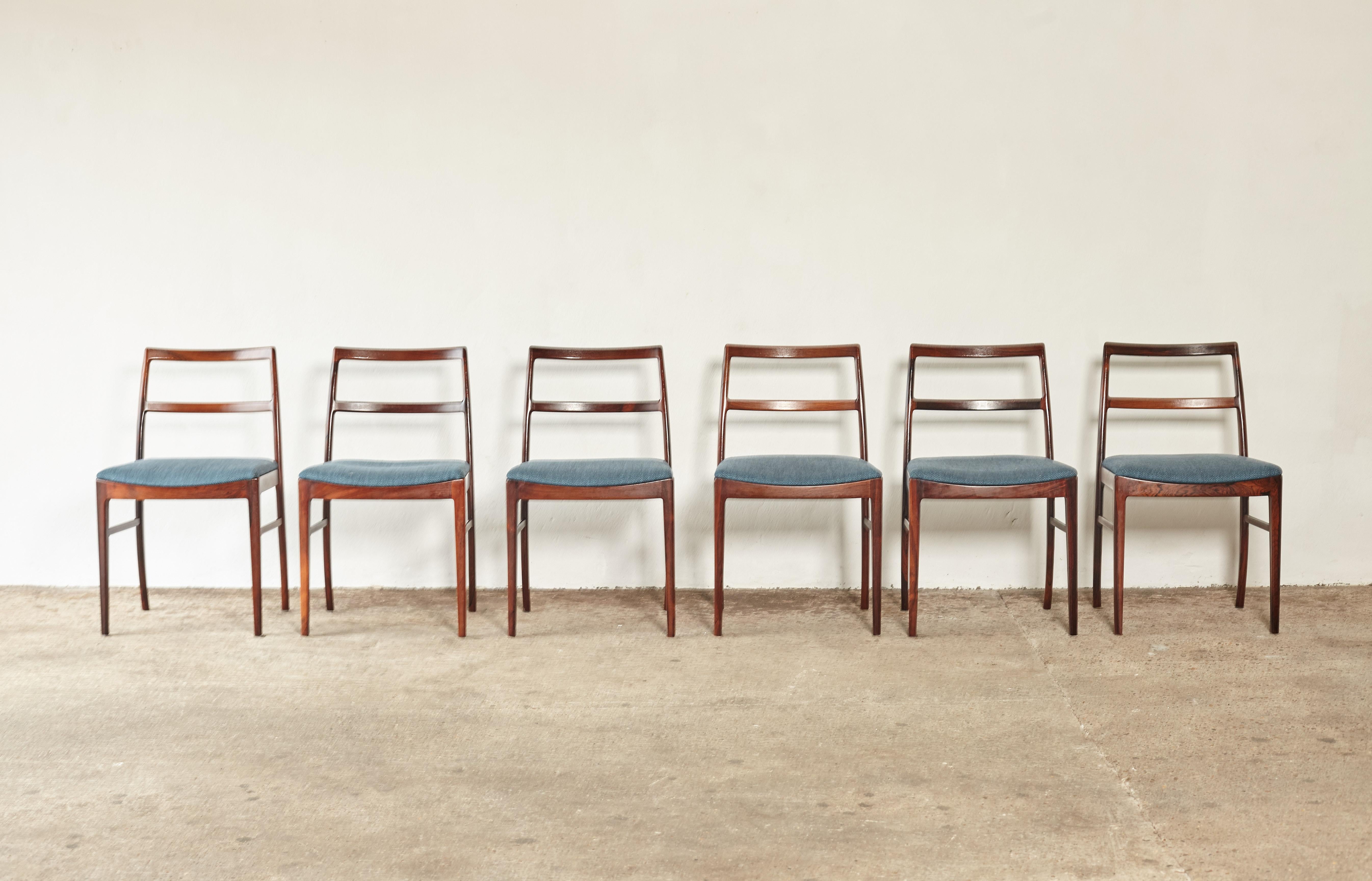 Set of six rosewood Arne Vodder Model 430 dining chairs, made by Sibast, Denmark, 1960s. The rosewood frames are in excellent original condition with a wonderful grain. Stamped with makers mark. Original blue wool fabric seats.