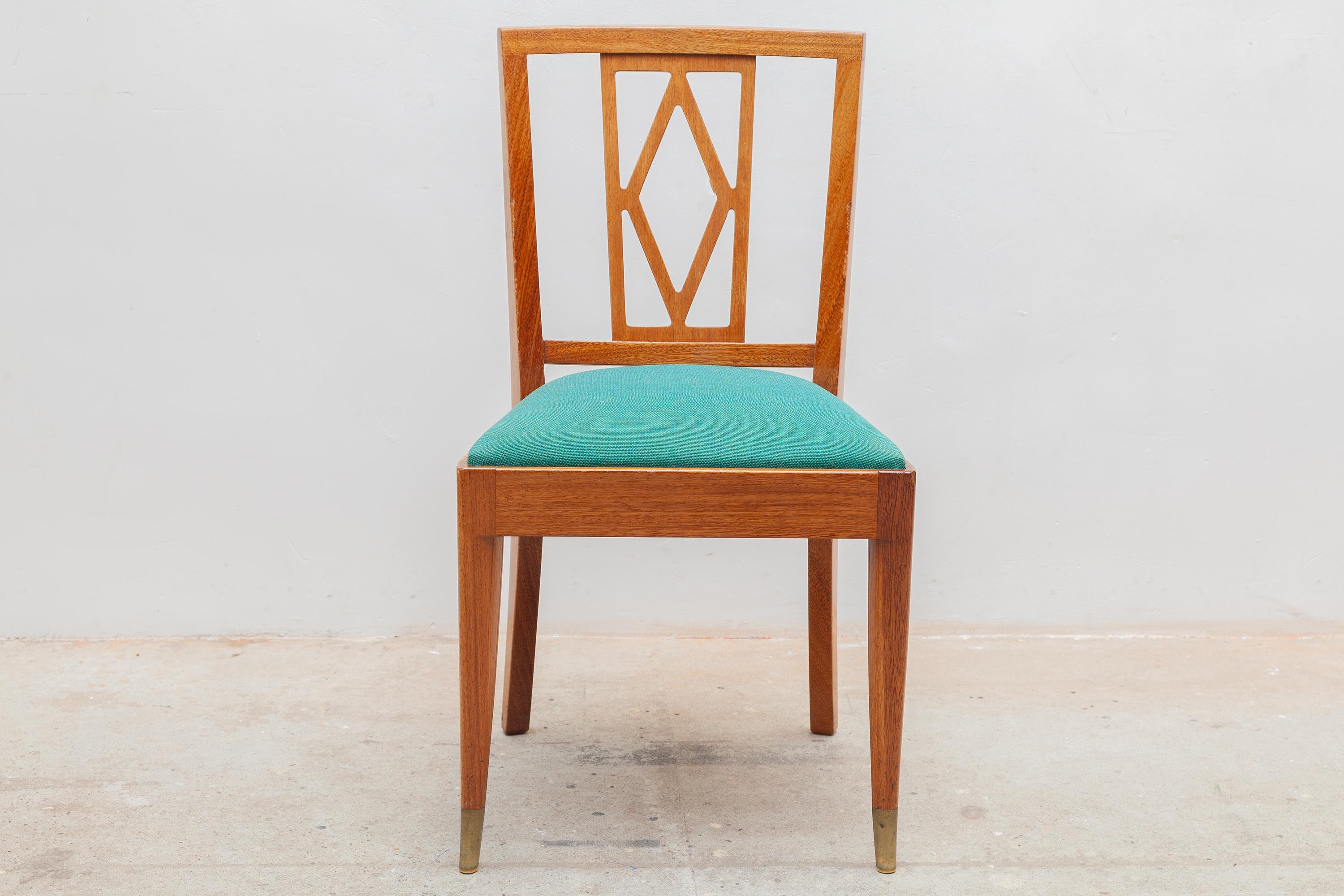 Set of six Art Deco De Coene Freres, Belgium dining chairs. Glossy wood frames with brass capped feet. Spring cushions in teal green upholstery. The six chairs are in excellent original condition.