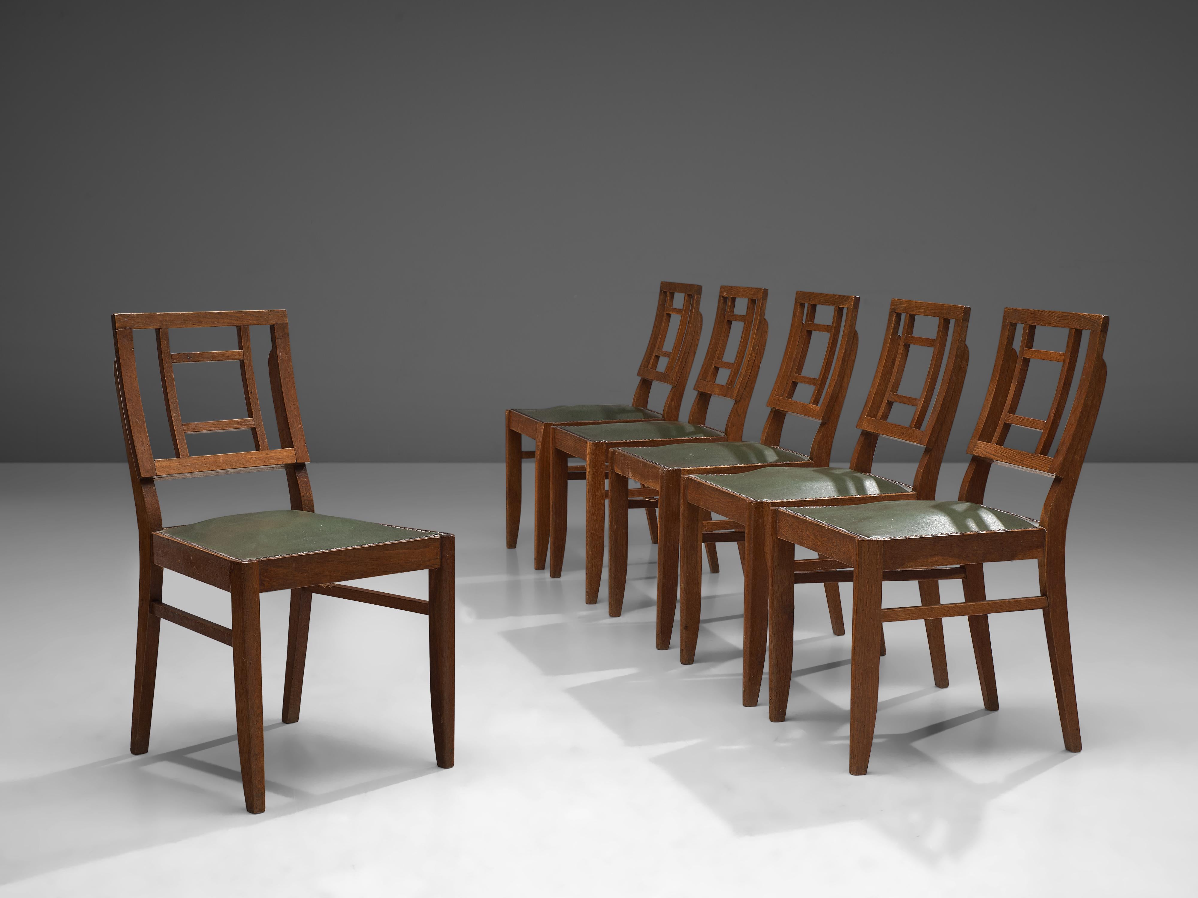 Milieu du XXe siècle Ensemble de six chaises de salle à manger Art Déco françaises en chêne foncé en vente