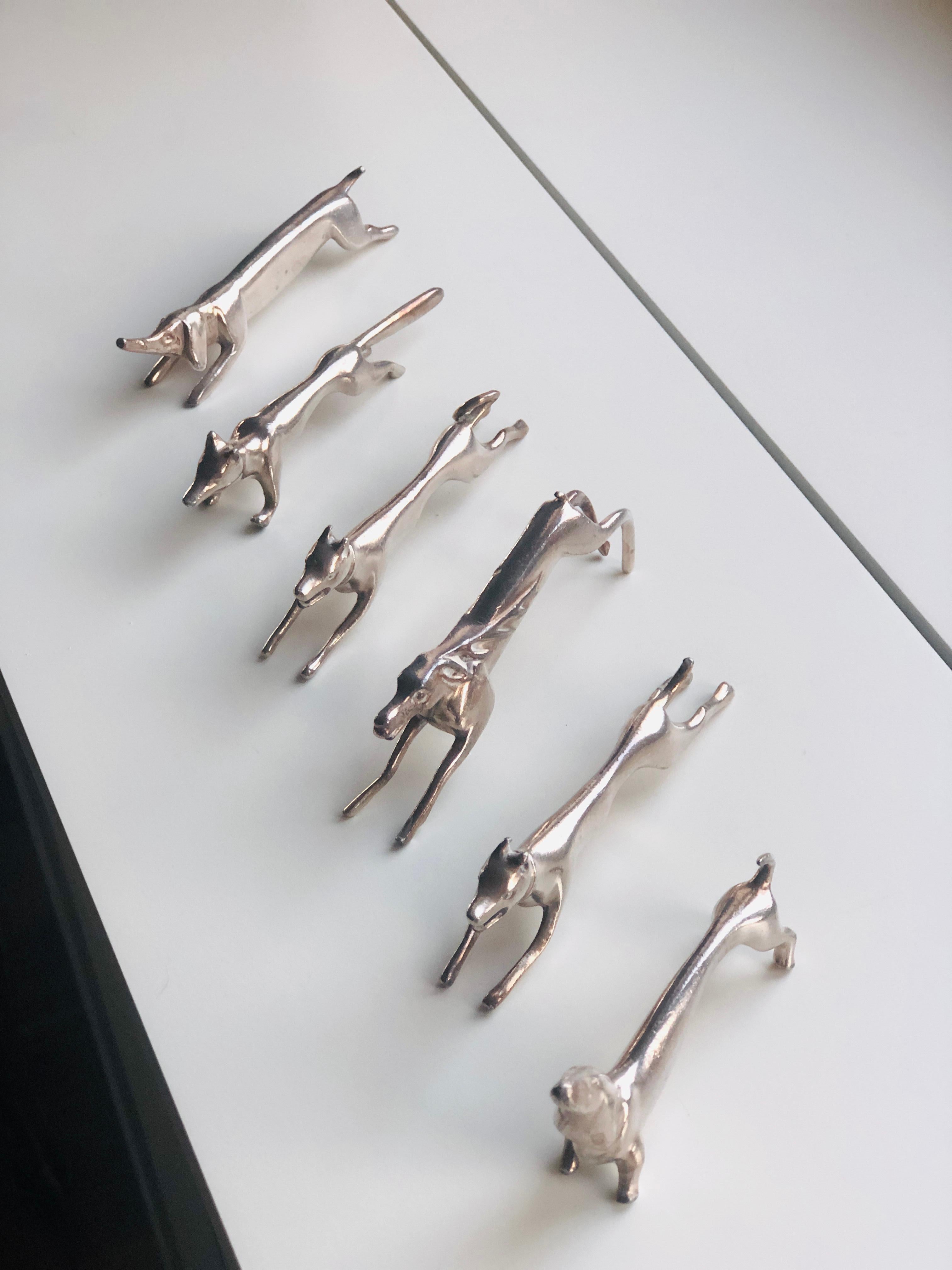 A fine set six Art Deco French silver plated animal knife rests featuring dogs and animals from the forest. The quality and heavily made knife rests are presented unboxed but all with makers marks.
France, circa 1930.