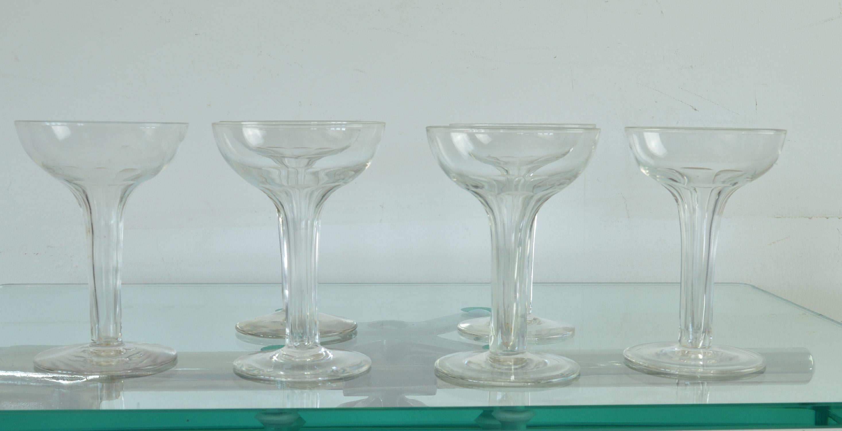 Very smart set of champagne glasses.

Fine quality crystal.

Hollow stemmed to allow the bubbles to rise.

English, 1920s.

 