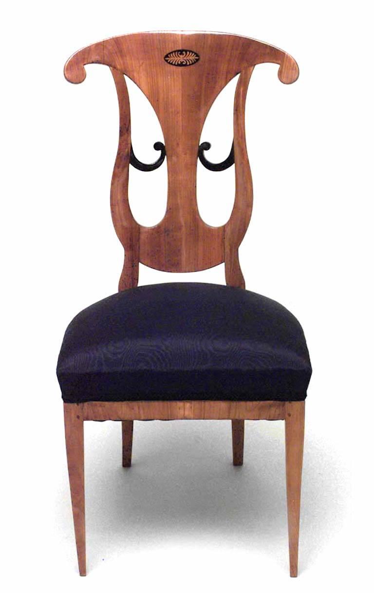 Set of 6 Austrian Biedermeier cherrywood side chairs with open scroll design back and ebonized medallion and trim. (Circa 1825)
