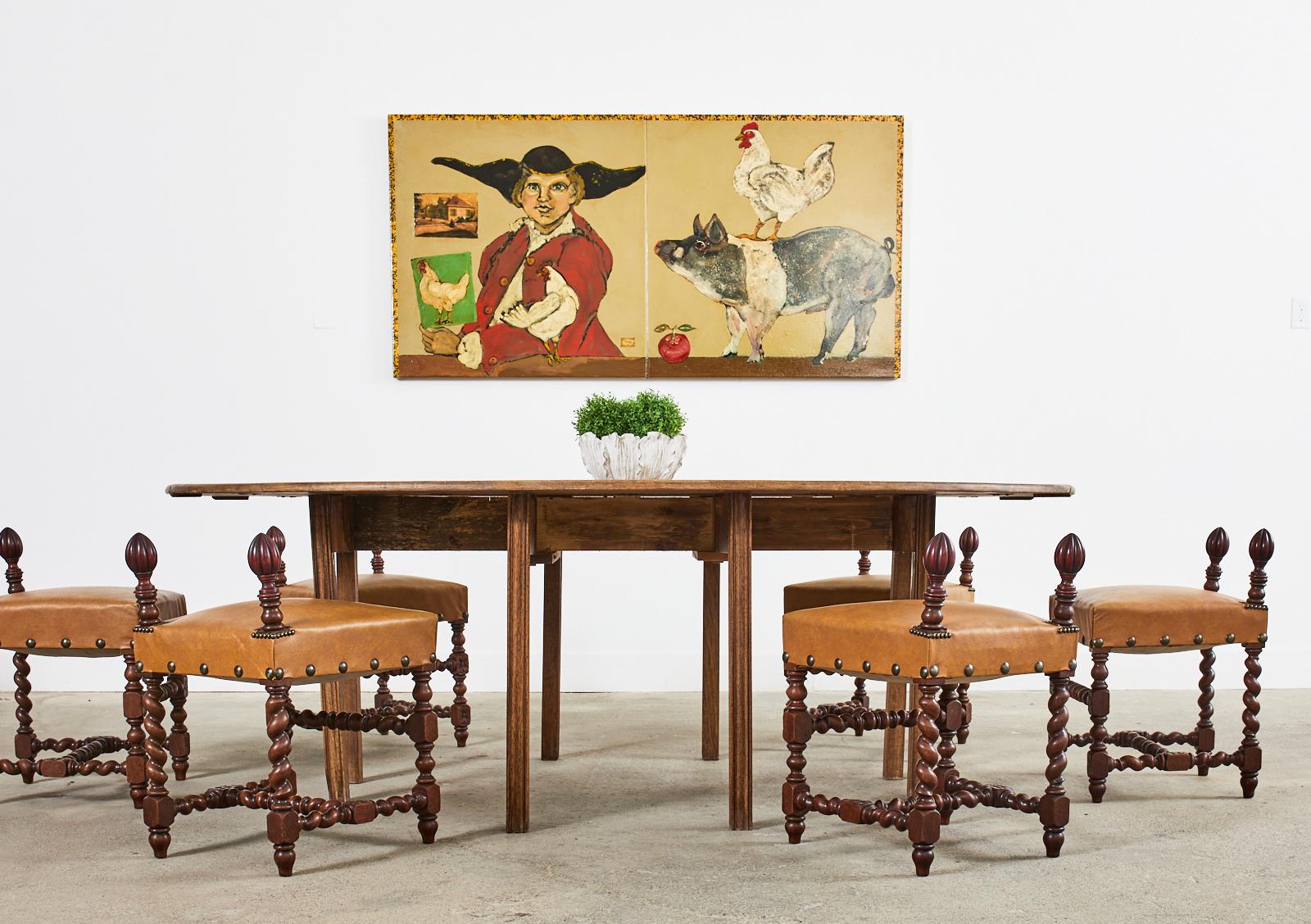 Set di sei sedie da pranzo in quercia inglese della fine del XIX secolo, riutilizzate e disegnate da Ira Yeager (America 1938-2022). Le sedie sono state realizzate in stile barocco o Luigi XIII con una seduta quadrata sostenuta da supporti torniti e