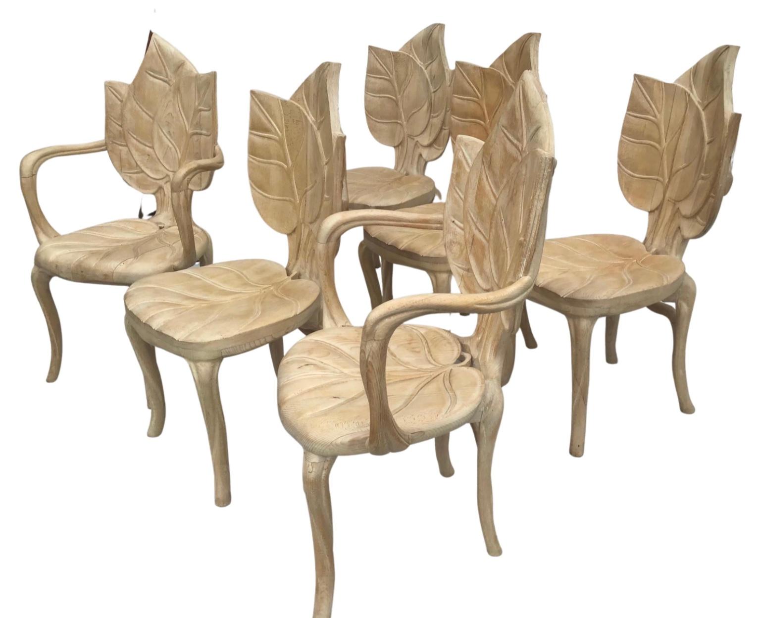 Unique set of hand carved leaf armchairs by Bartolozzi and Maioli. Surrealist fantasy furniture. The back of the chair and the seat are carved with leaves motifs.
Organic shaped arms and feet. 