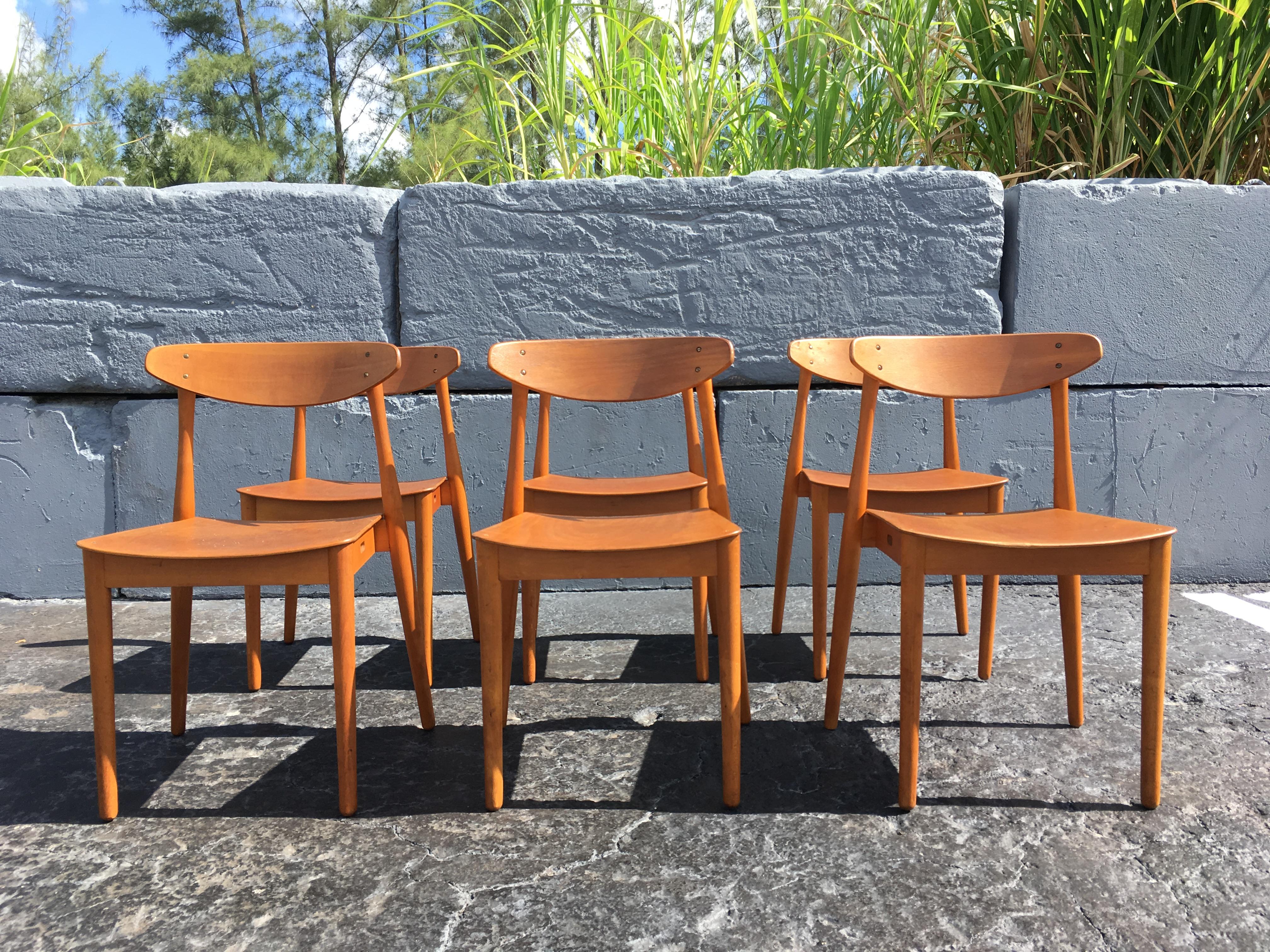 6 beautiful Danish dining chairs with bentwood seats and backs. Chairs are stackable.