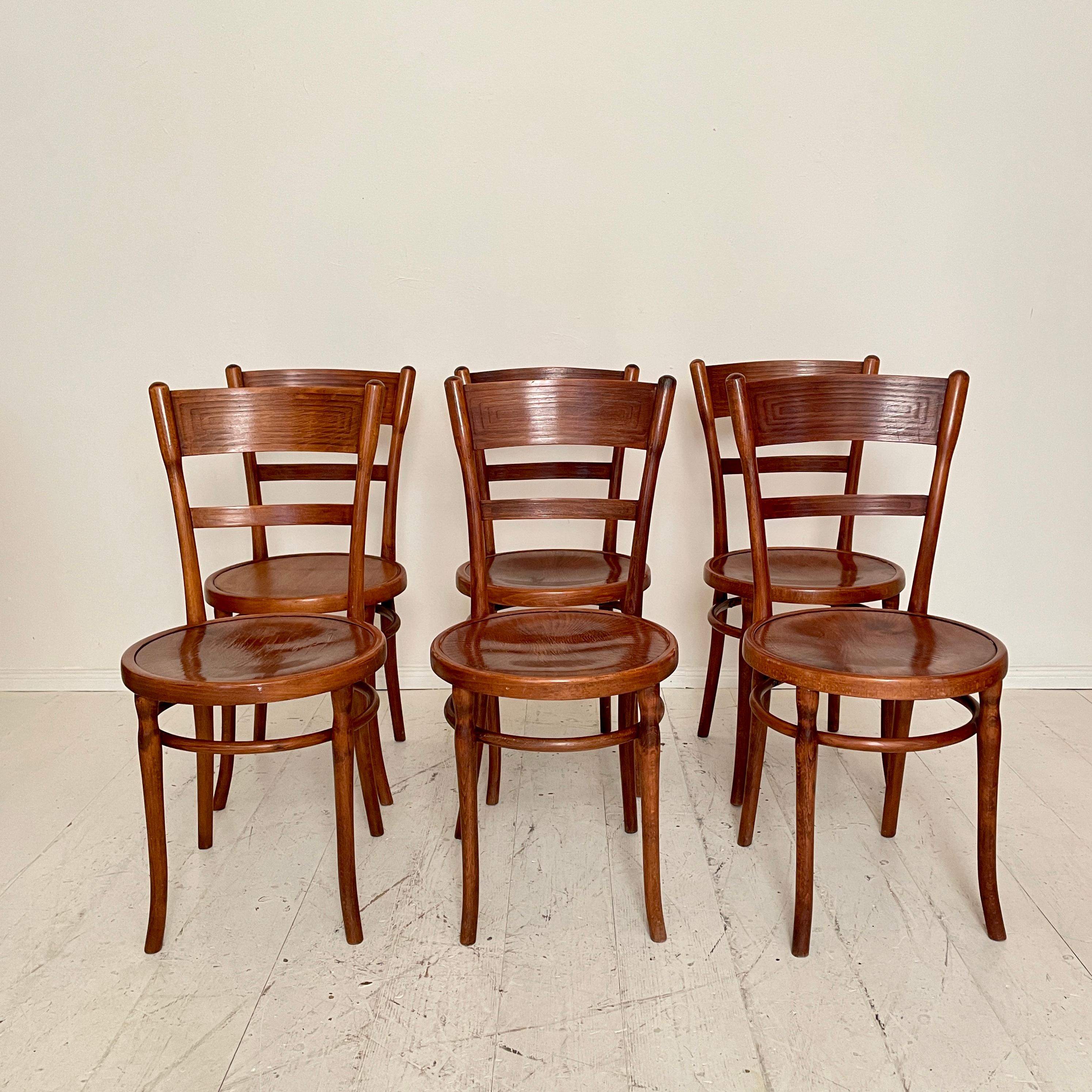 This fantastic set of six Jugendstil bentwood dining chairs have been made in the 1930s in Berlin.
They are in beautiful original condition and have got a great Patina.
Apart from one which has got the seat plate replaced. But it is good aged and