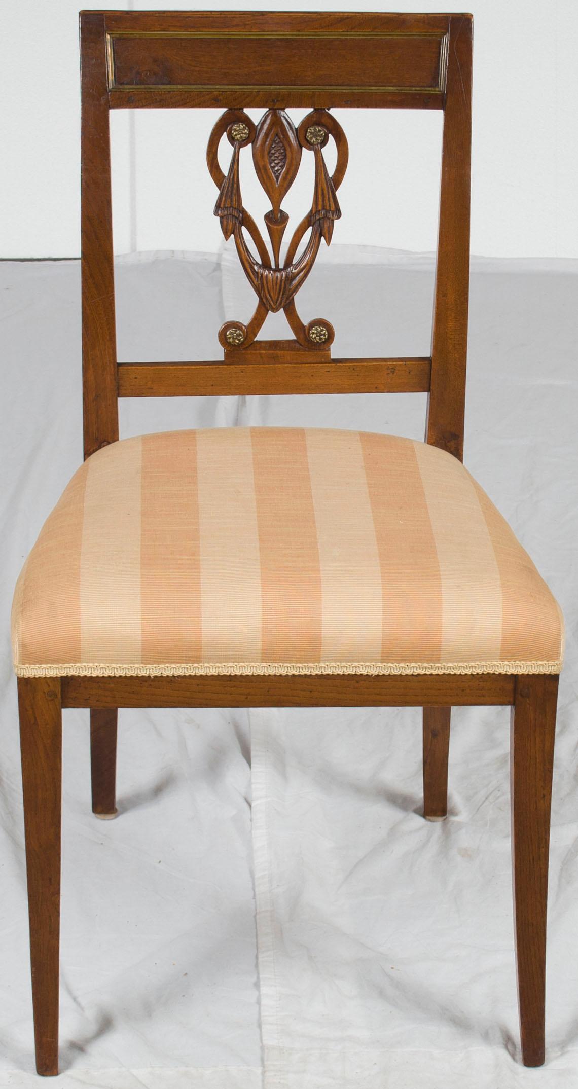 Here we have a unique set of six vintage dining chairs that were made of oakwood. They were constructed in a unique Biedermeier style sometime around the year 1940. Today the remain gorgeous and ready to be used in your kitchen or dining