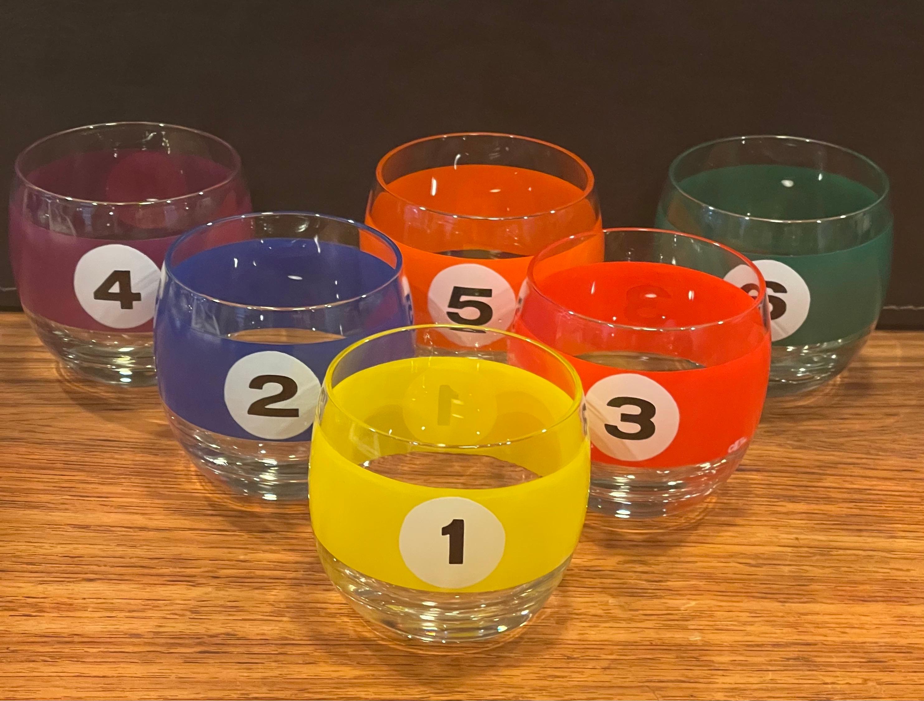 Great set of six billiard / pool balls roll poly cocktail glasses by Cera, circa 1970s. Each glass resembles a billiard ball with a number and colorful stripe. These glasses are very difficult to find in a set and are numbered 1 through 6; they are