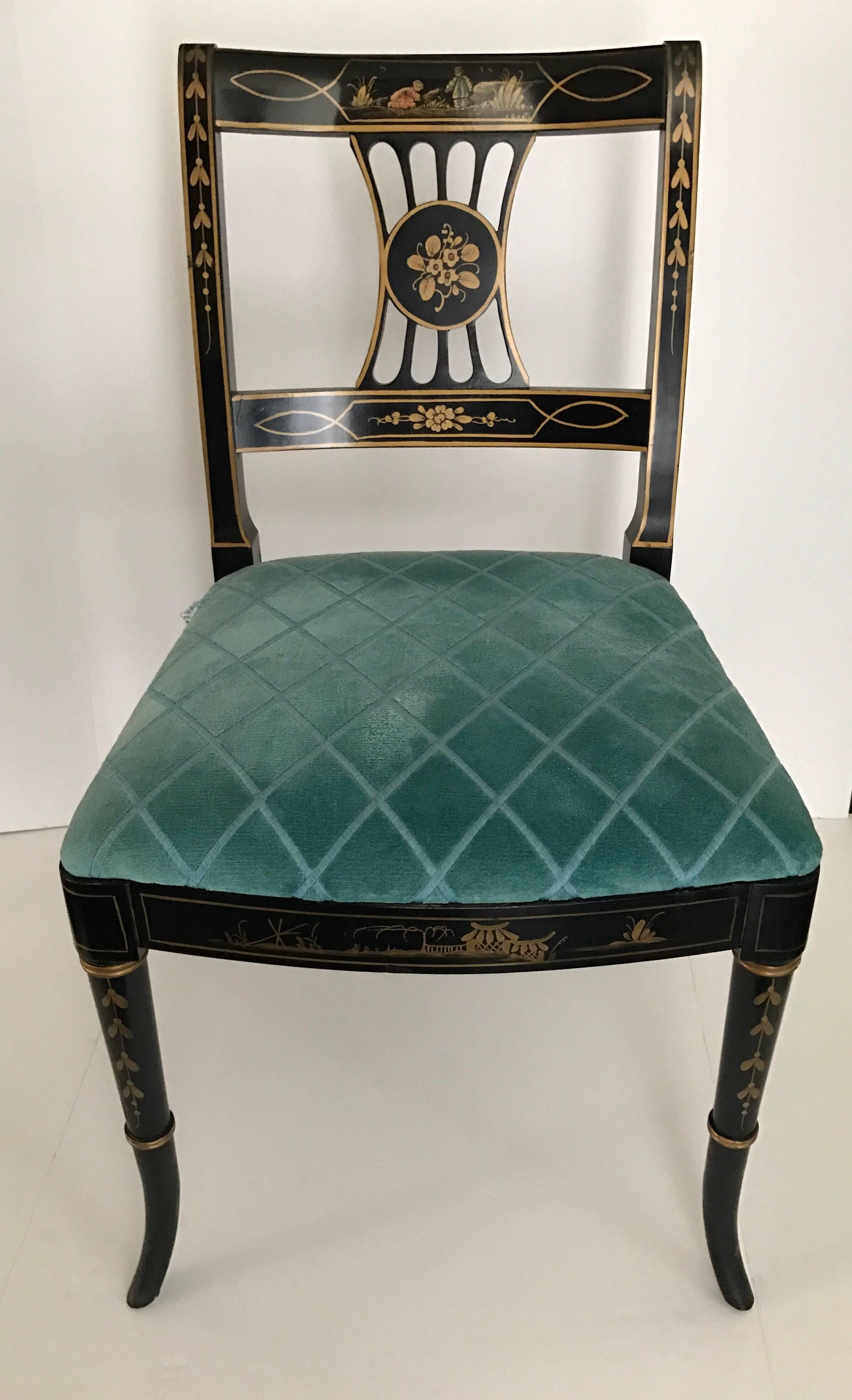 Elegant black laquered chinoiserie chairs with gilt painted scenery and detail. Set of six matching dining chairs include four side chairs and two armchairs.
Handmade by renowned cabinet maker Union National Jamestown, NY.
 