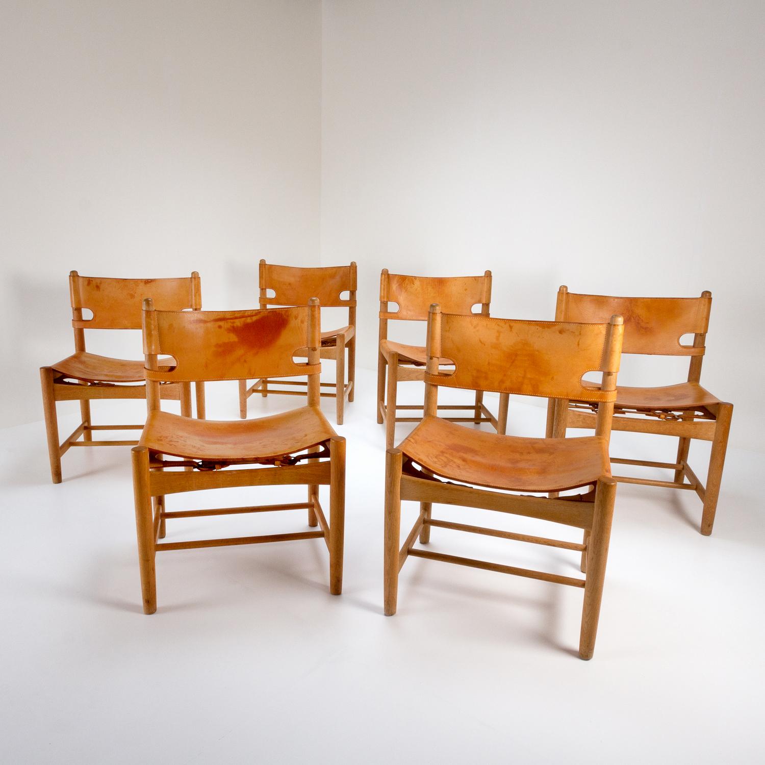 A set of six BM 3237 solid oak and cognac leather hunter dining chairs by Børge Mogensen for Fredericia, Denmark, 1960s.