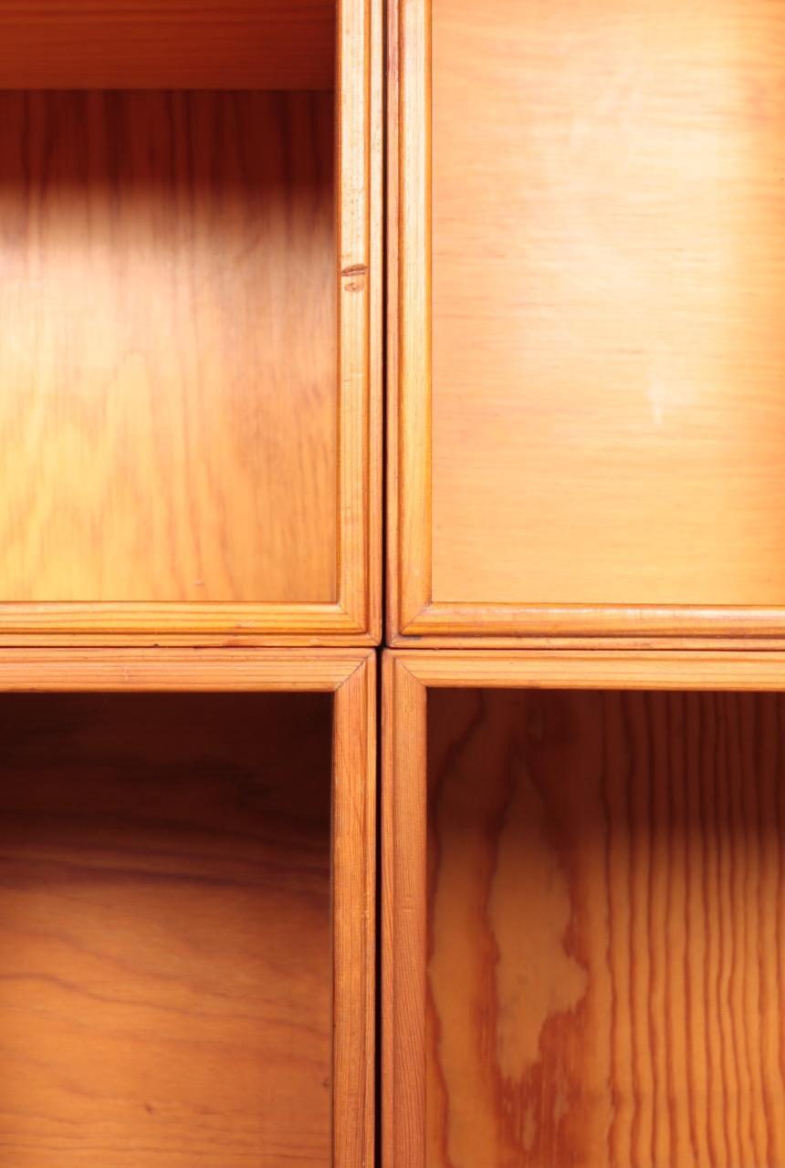 6 matching bookcases in solid pine designed by Mogens Koch for Rud. Rasmussen cabinetmakers in 1933. Made in Denmark and in all original condition.