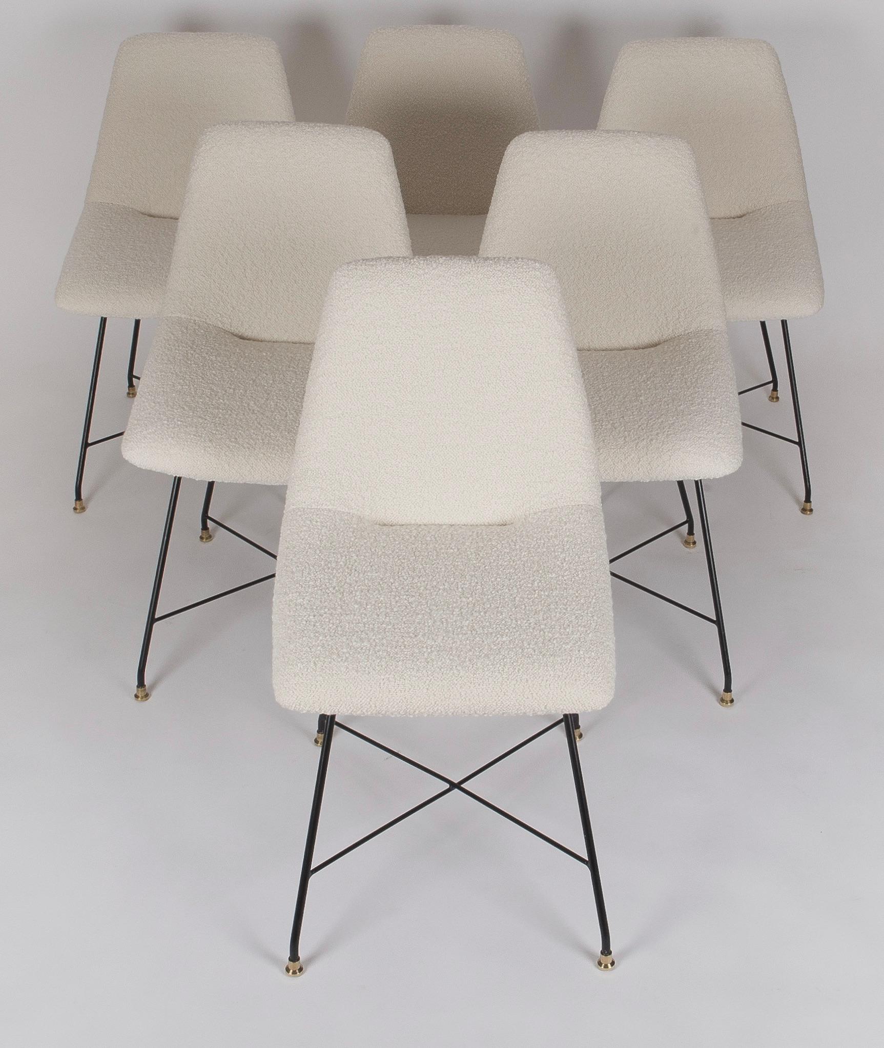 A beautiful set of six 'Aster' chairs designed by Augusto Bozzi for Fratelli Saporiti in 1956. The internal hand-made plywood frame seat has been completely restored with new foams and re-upholstered in an off-white bouclé fabric from Dedar Milano.