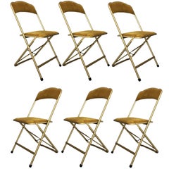 Set of Six Brass and Velvet Plia Style Folding Chairs