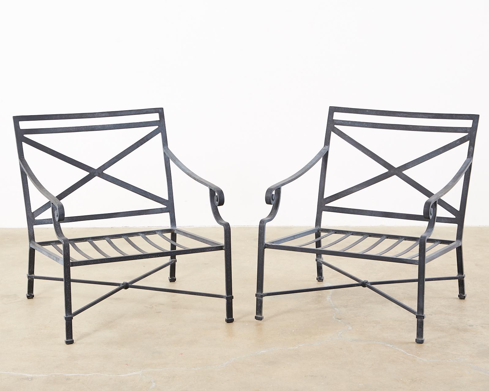 Bright set of six large patio or garden lounge chairs made by Brown Jordan. Constructed from wrought aluminum with a multi-step powder coated finish. The black metal patina has very faint silver and gold flecks on the finish. Known as Brown Jordan's