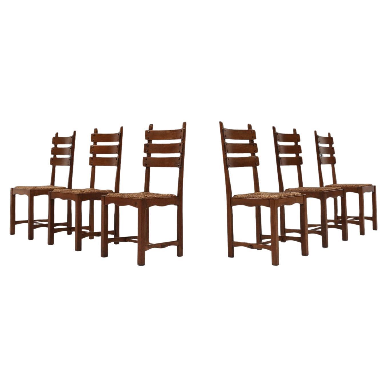 Set of Six Brutalist Dining Chairs in Oak an Wicker For Sale