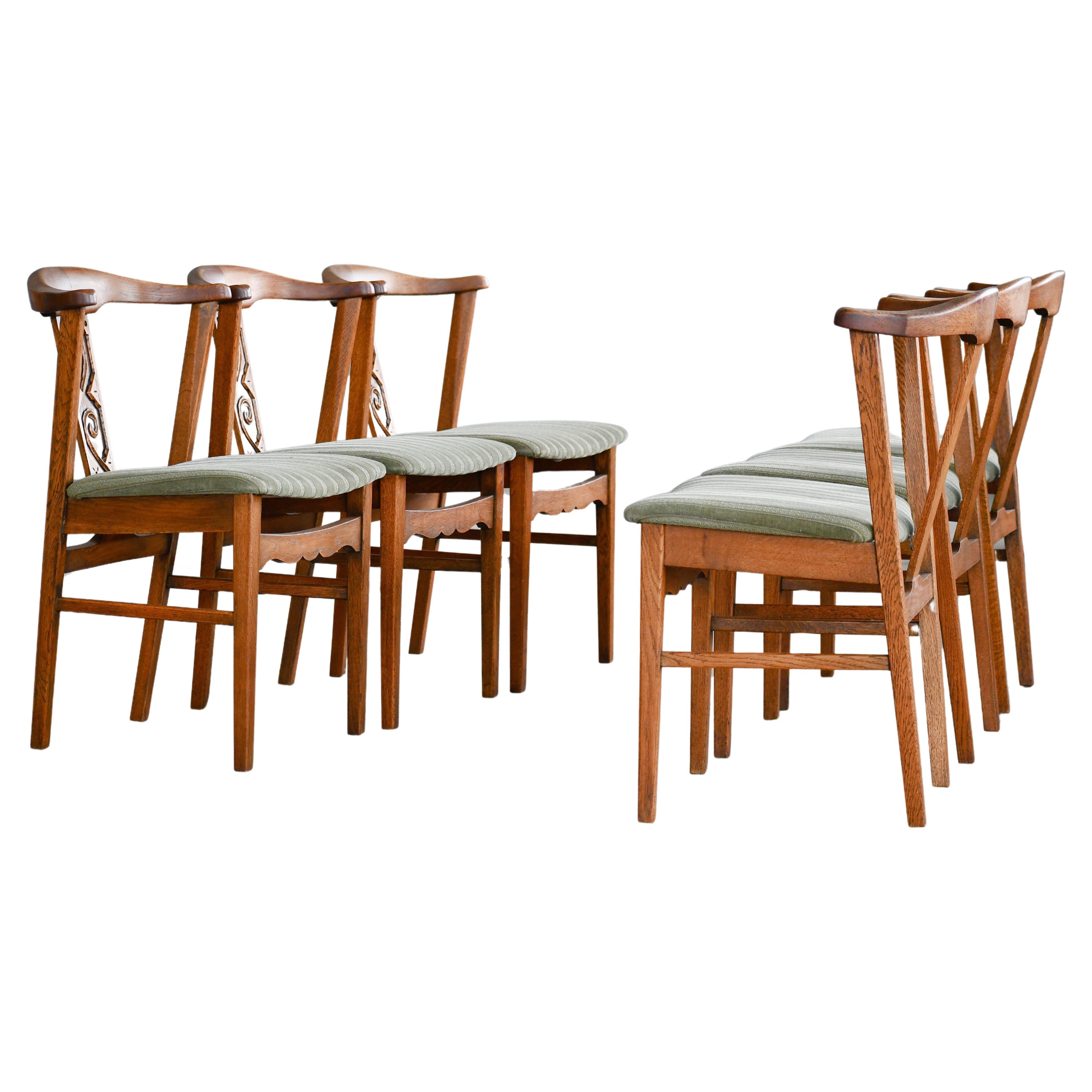Set of Six Brutalist Dining Chairs in Solid Carved Oak by Henning Kjærnulf 60's
