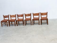 Set of six brutalist leather dining chairs