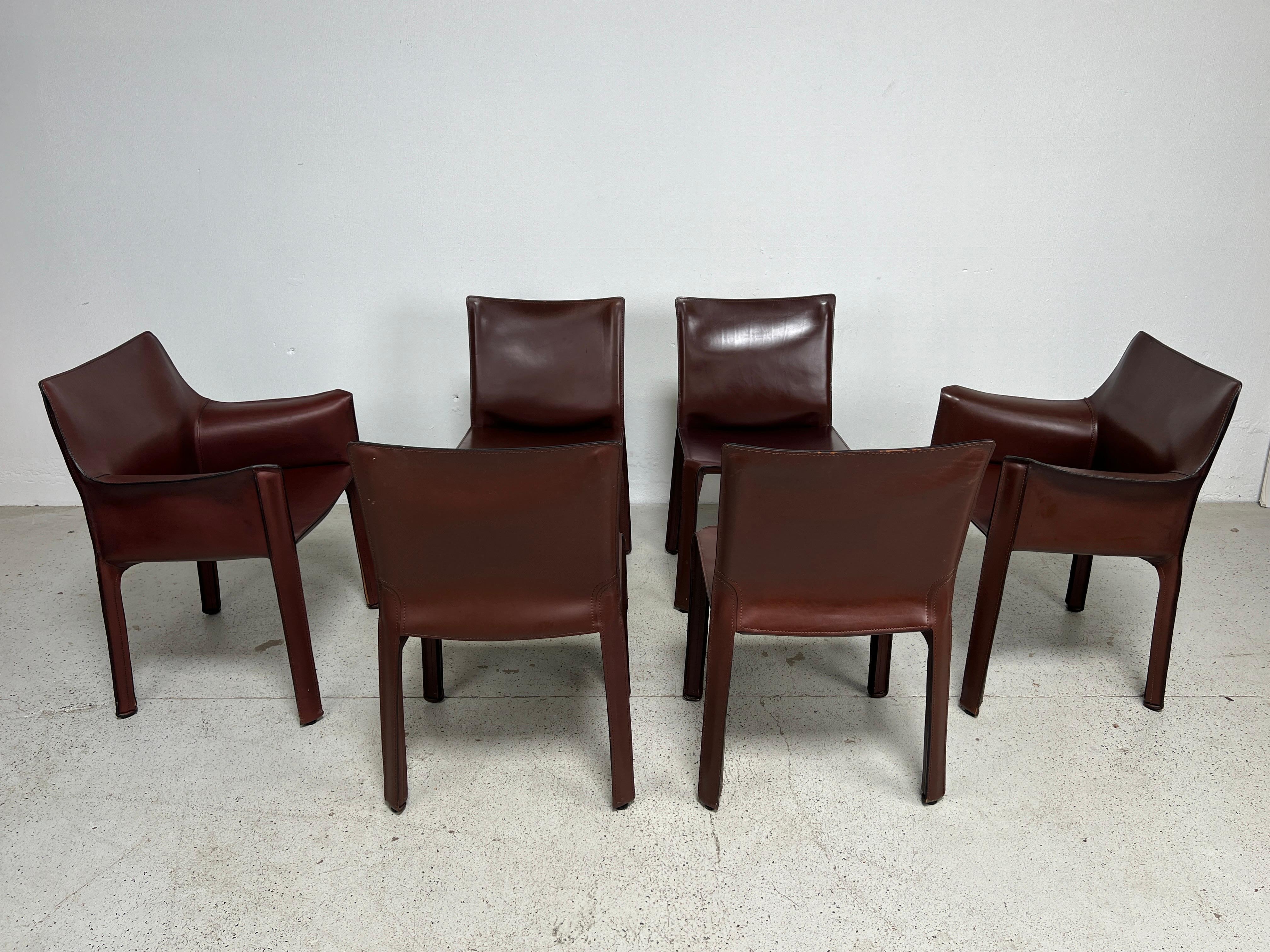 A beautiful set of patinated reddish brown leather Cab chairs by Mario Bellini for Cassina. 
