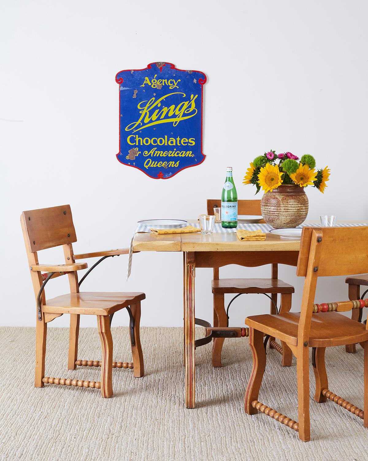 Classic set of six Rancho Monterey dining chairs by Frank Mason for Mason Furniture. California Mission style made of hand-crafted alder and iron. Set consists of five side chairs and one armchair measuring 26.5 inches wide. Whimsical style with