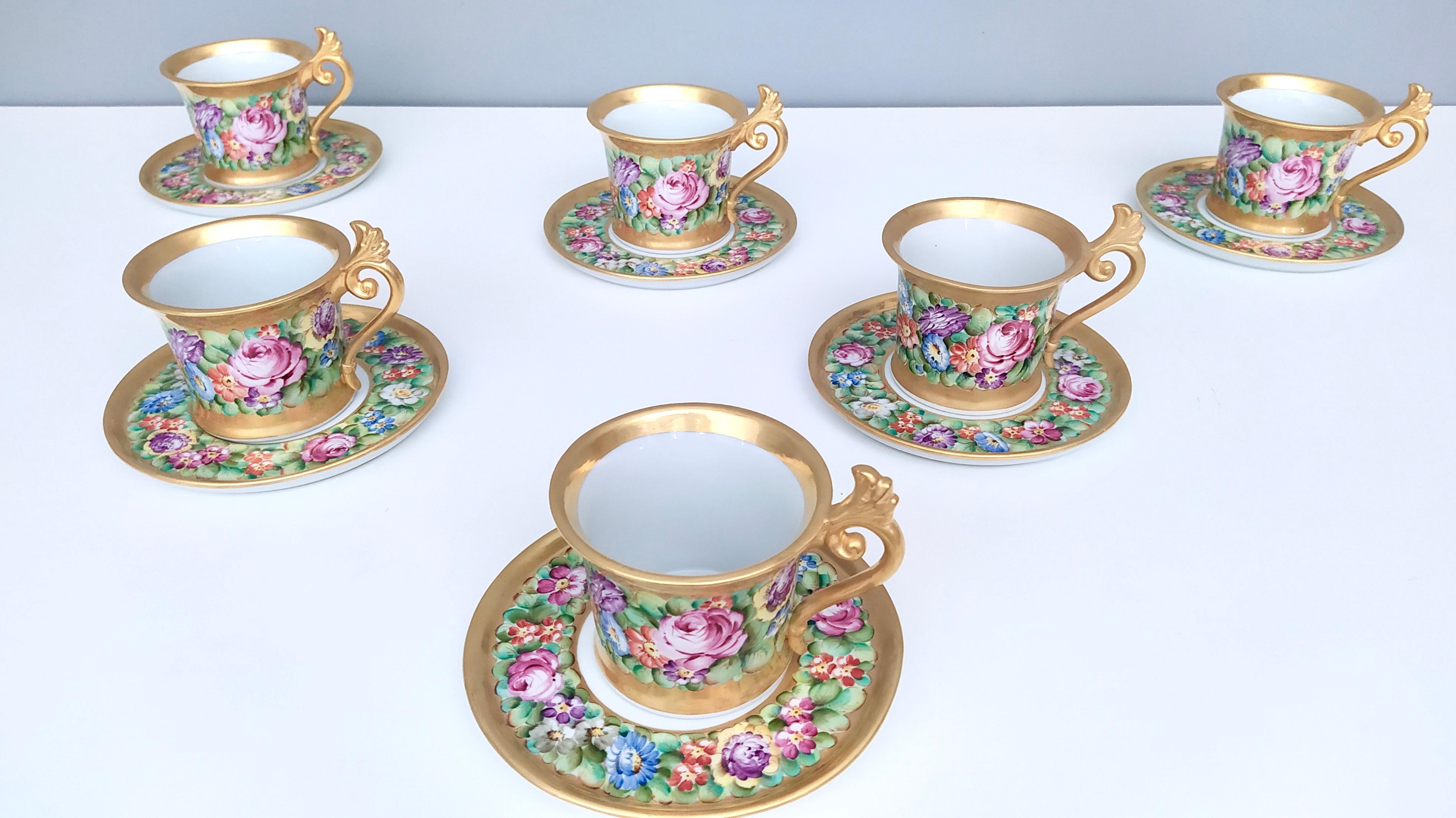 Made in Italy, 1950s.
This set is made in Capodimonte porcelain and features hand painted floral motifs and golden edges.
They are vintage therefore they might show slight traces of use, but they can be considered as in excellent original condition,