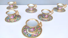 Ensemble de six tasses à thé / café en porcelaine de Capodimonte avec motifs floraux, Italie