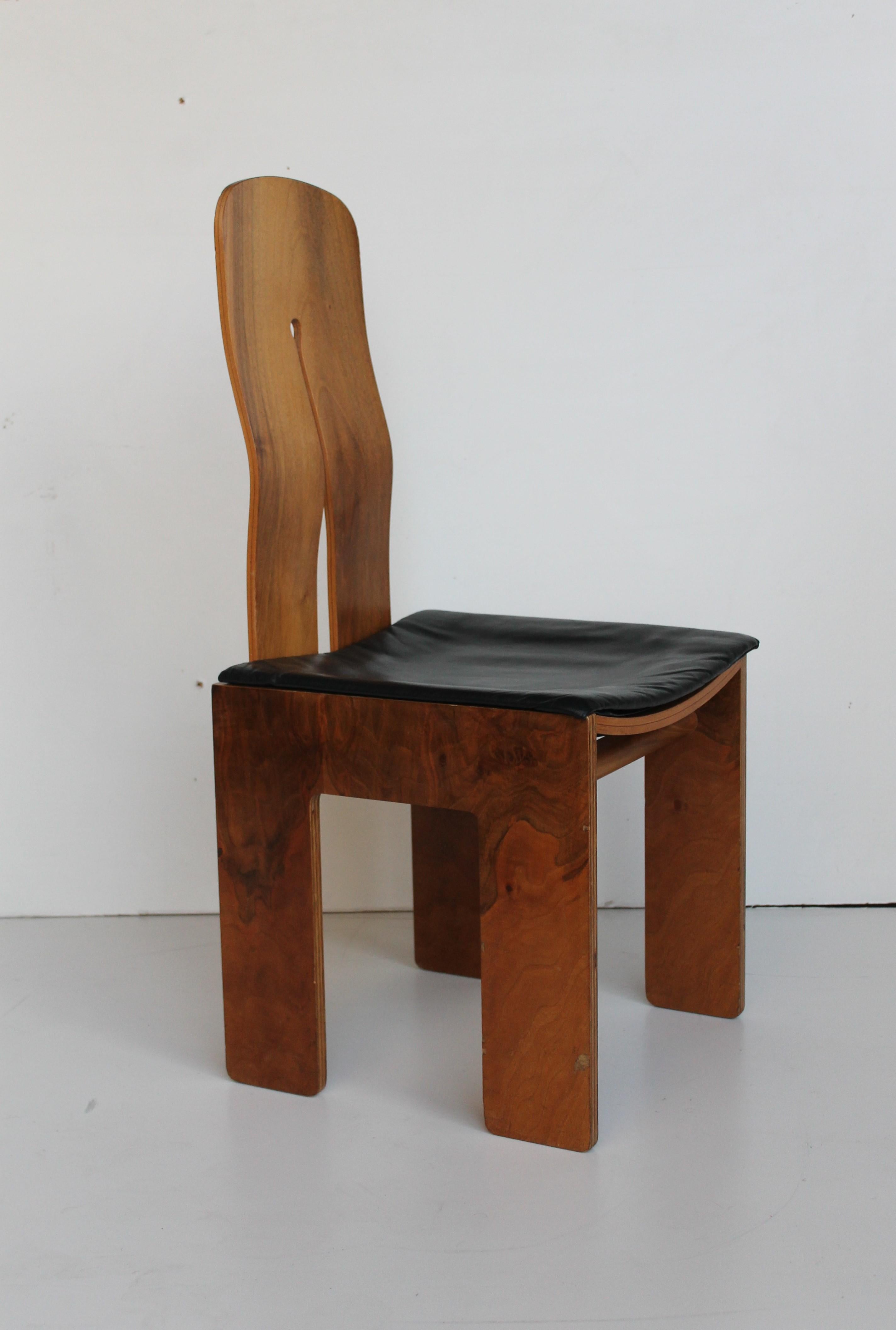 Carlo Scarpa walnut and black leather chairs mod. 1934/765 for Bernini, 1977.


765 is planned by Carlo Scarpa in 1934, year from which the chair will take subsequently the name, but it will be produced only in the 1977.

The author realizes