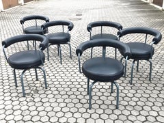 Set of Six Cassina Swivel Arm Chairs LC7 by Le Corbusier, Perriand & Jeanneret