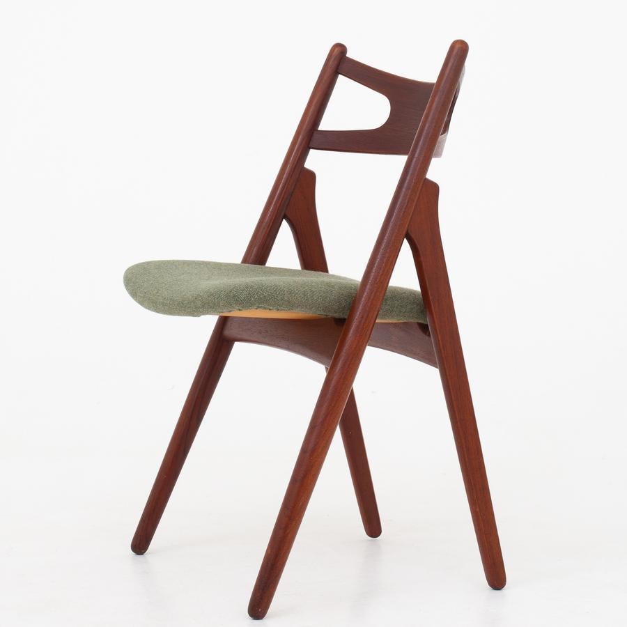 Set of six CH 29, saw-bench chairs in teak and green wool. Maker Carl Hansen.