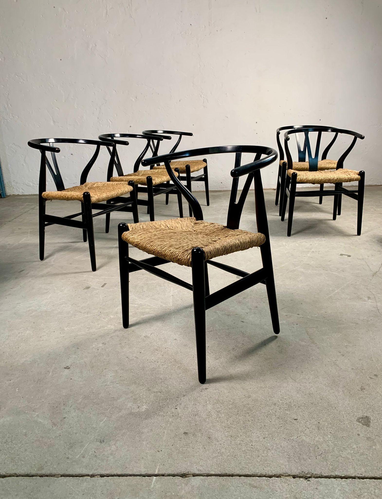 Set of six CH24 Wishbone chairs by Hans Wegner, Manufactured by Carl Hansen, Denmark, 1950. 

The model also known as the “Y” or CH24 Chair, design in 1949, was inspired by portraits of Danish merchants sitting on Ming Dynasty Chinese chairs. The