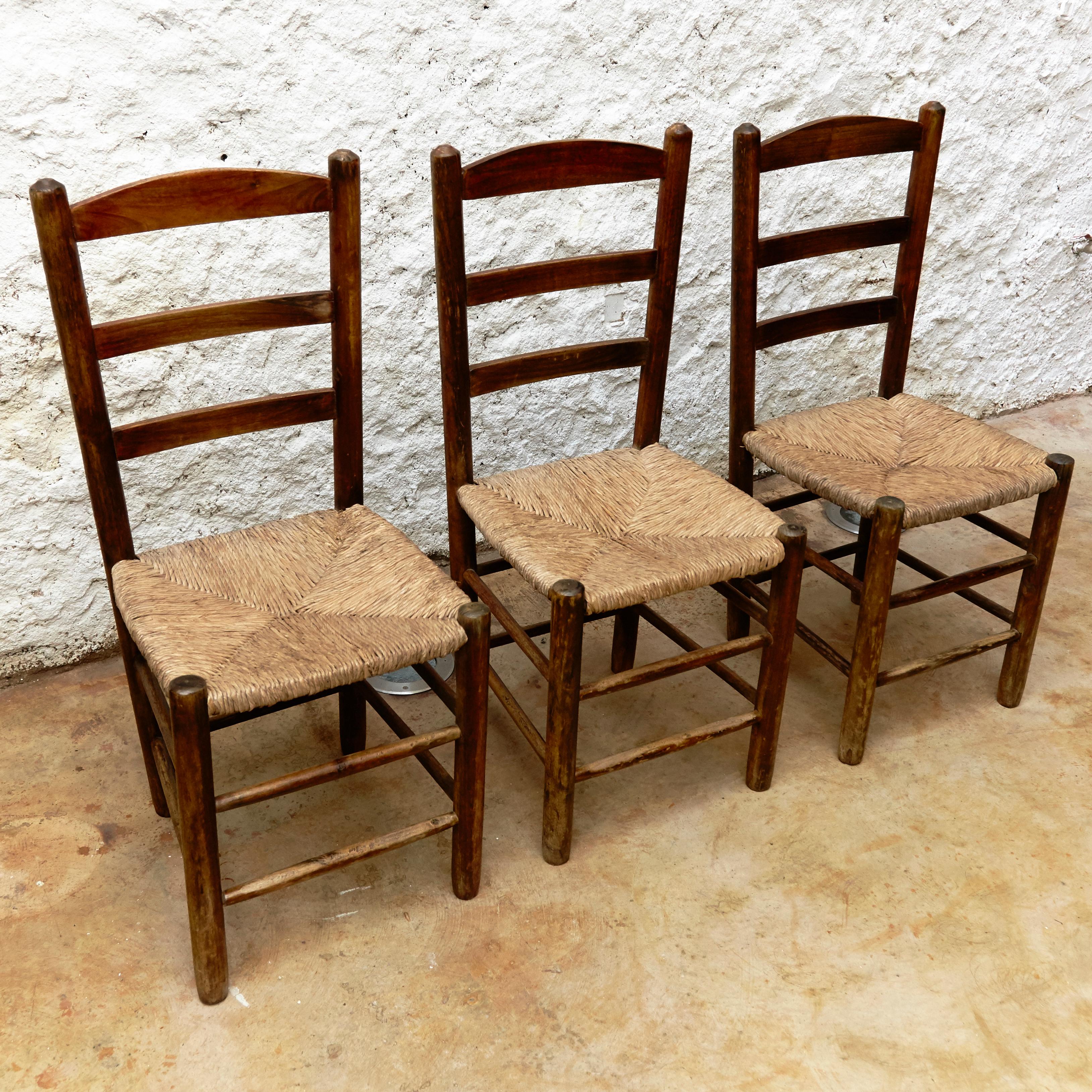 Mid-Century Modern Set of Six Chairs after Charlotte Perriand in Wood and Rattan, circa 1950