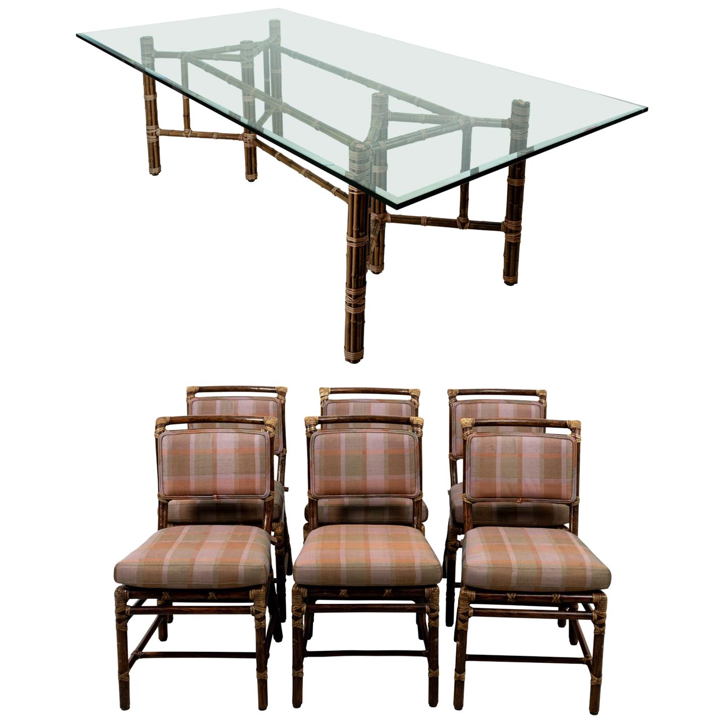Set of Six Chairs and Dining Room Table by McGuire For Sale
