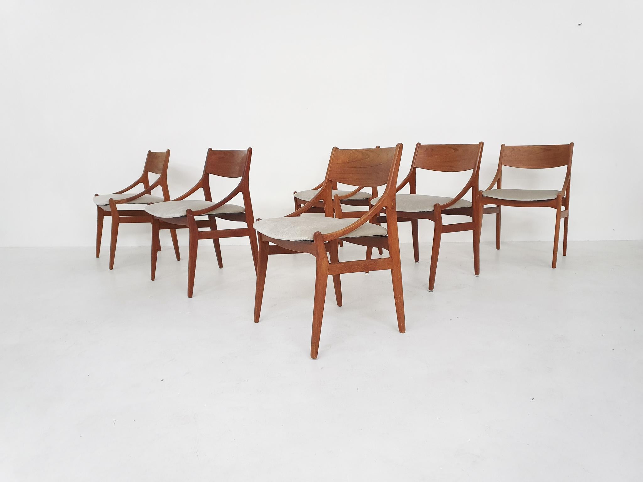 Set of six teak dining chairs with new beige velvet upholstery and filling.
Marked at the bottom (under the fabric).