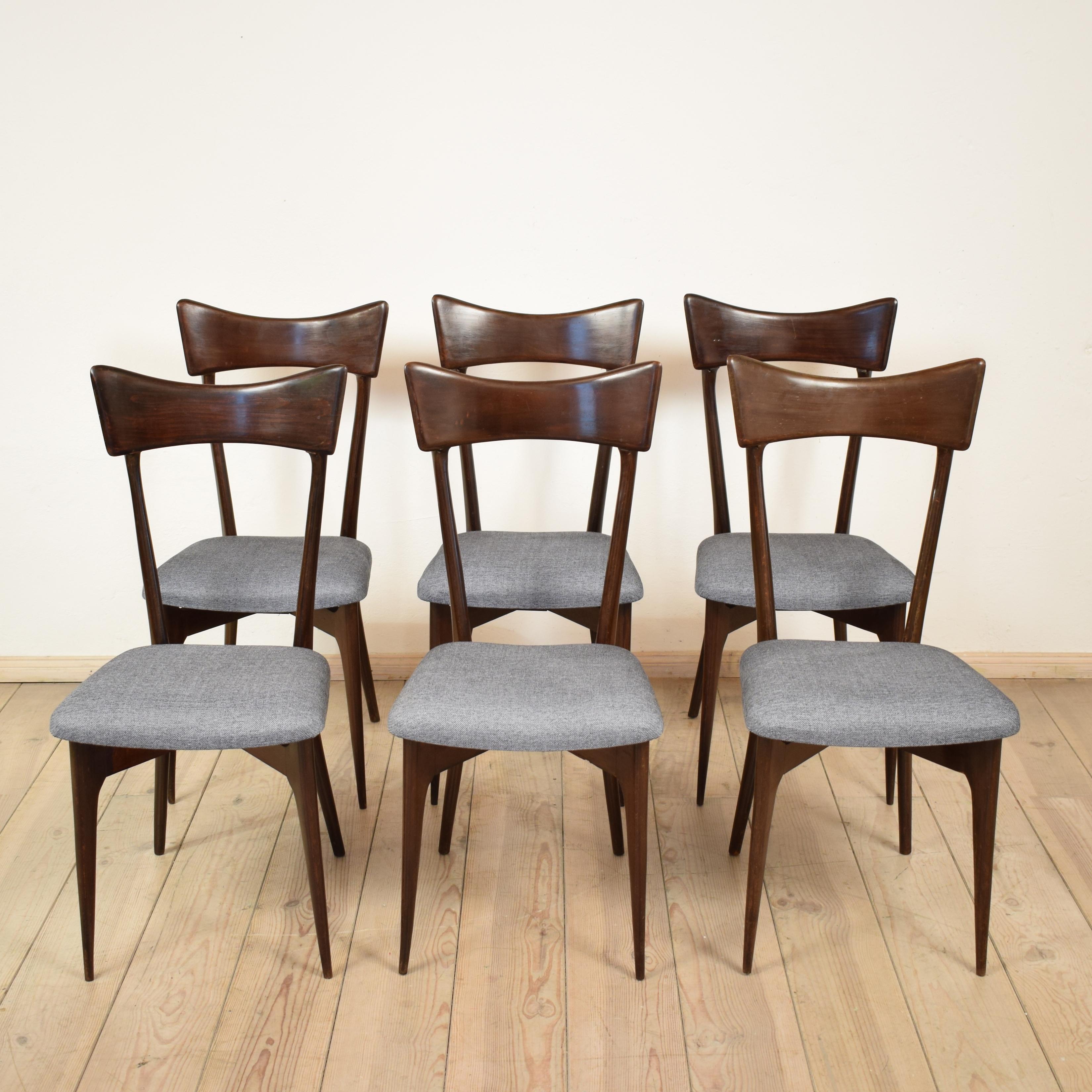 This set of six chairs was designed by Ico Parisi, circa 1945. It was produced by Colombo Cantu in Italy.
The chairs are in very good condition and have a great Patina. The seat covers are redone in a grey/blue fabric.
