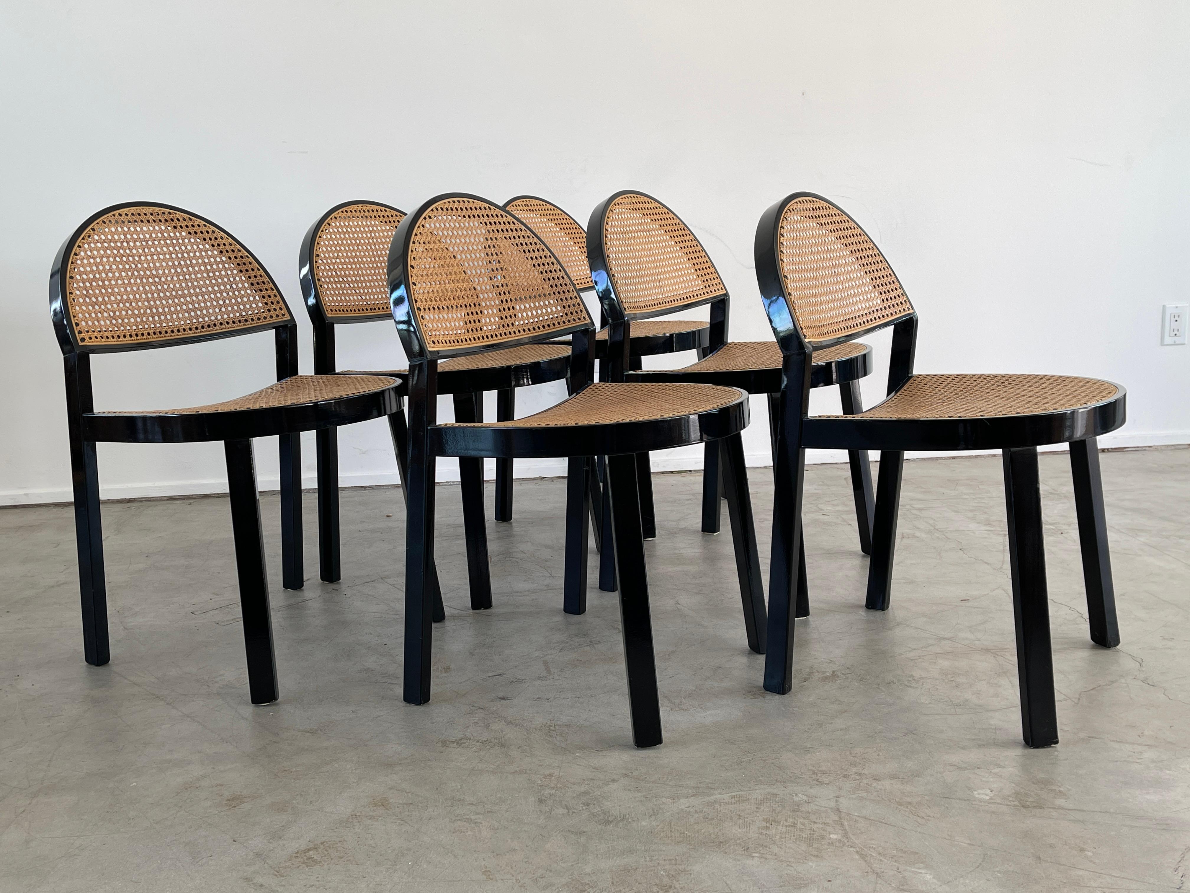Elegant set of six Italian chairs by designers Jonathan de Pas & Donato D'urbino. Newly refinished ebony finish with original Italian caned seats and backs. Sold as a set.