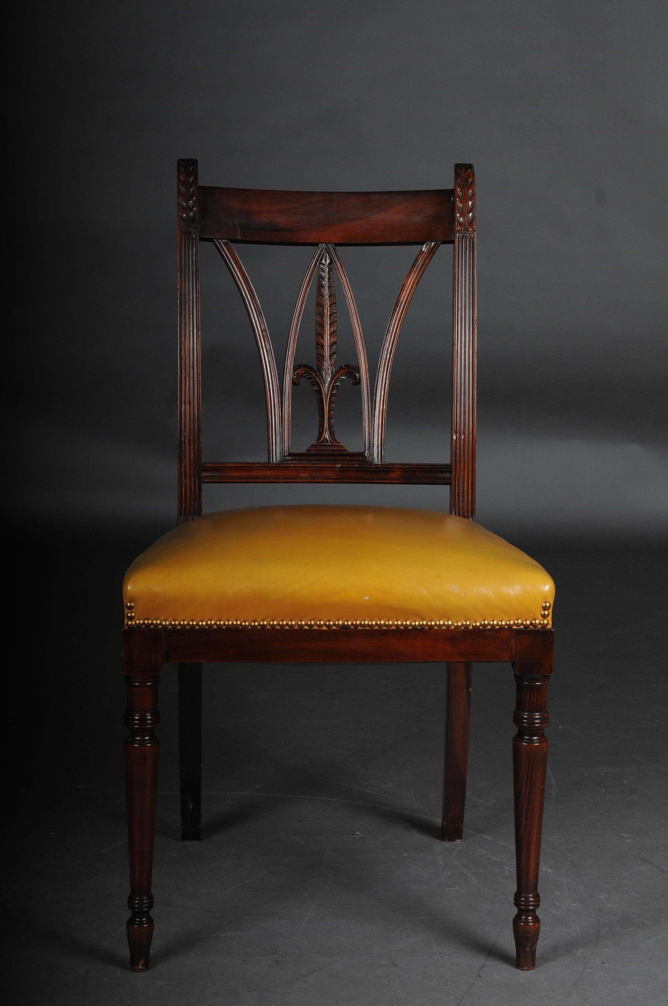 Set of 6 chairs England Victorian 20th century, mahogany, leather.

Solid wood mahogany, England Victorian 20th century fine and timeless lines, a seat of the highest quality. Carved solid wood. Rich carving. Very finely designed frame with relief
