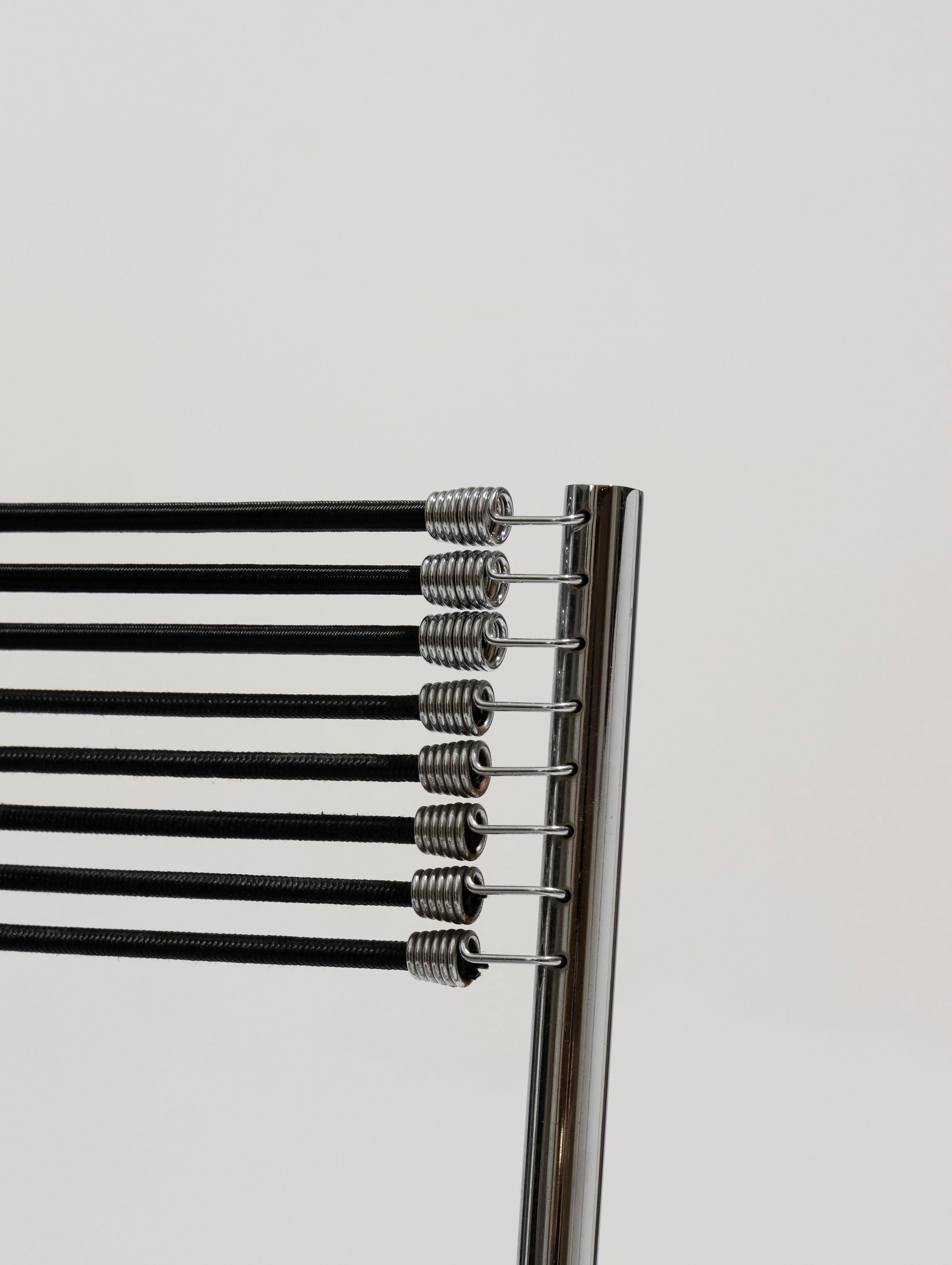 Set of six chairs in steel and elastic cord, René Herbst, 1970s 5