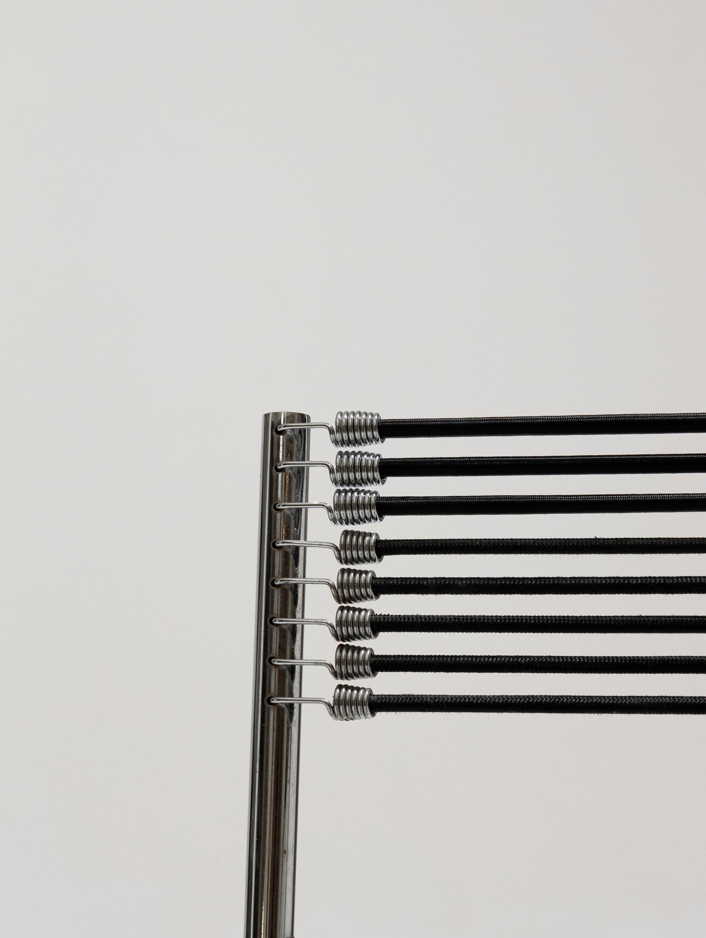 Set of six chairs in steel and elastic cord, René Herbst, 1970s 6