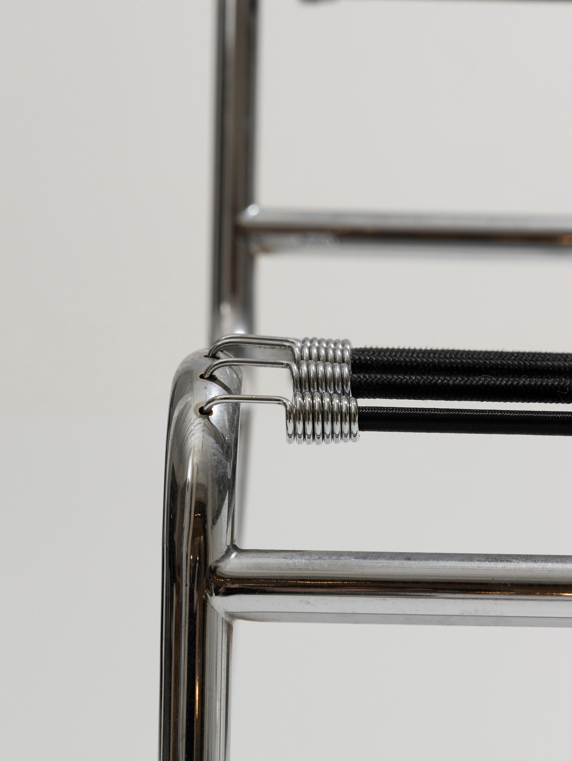 Set of six chairs in steel and elastic cord, René Herbst, 1970s 7