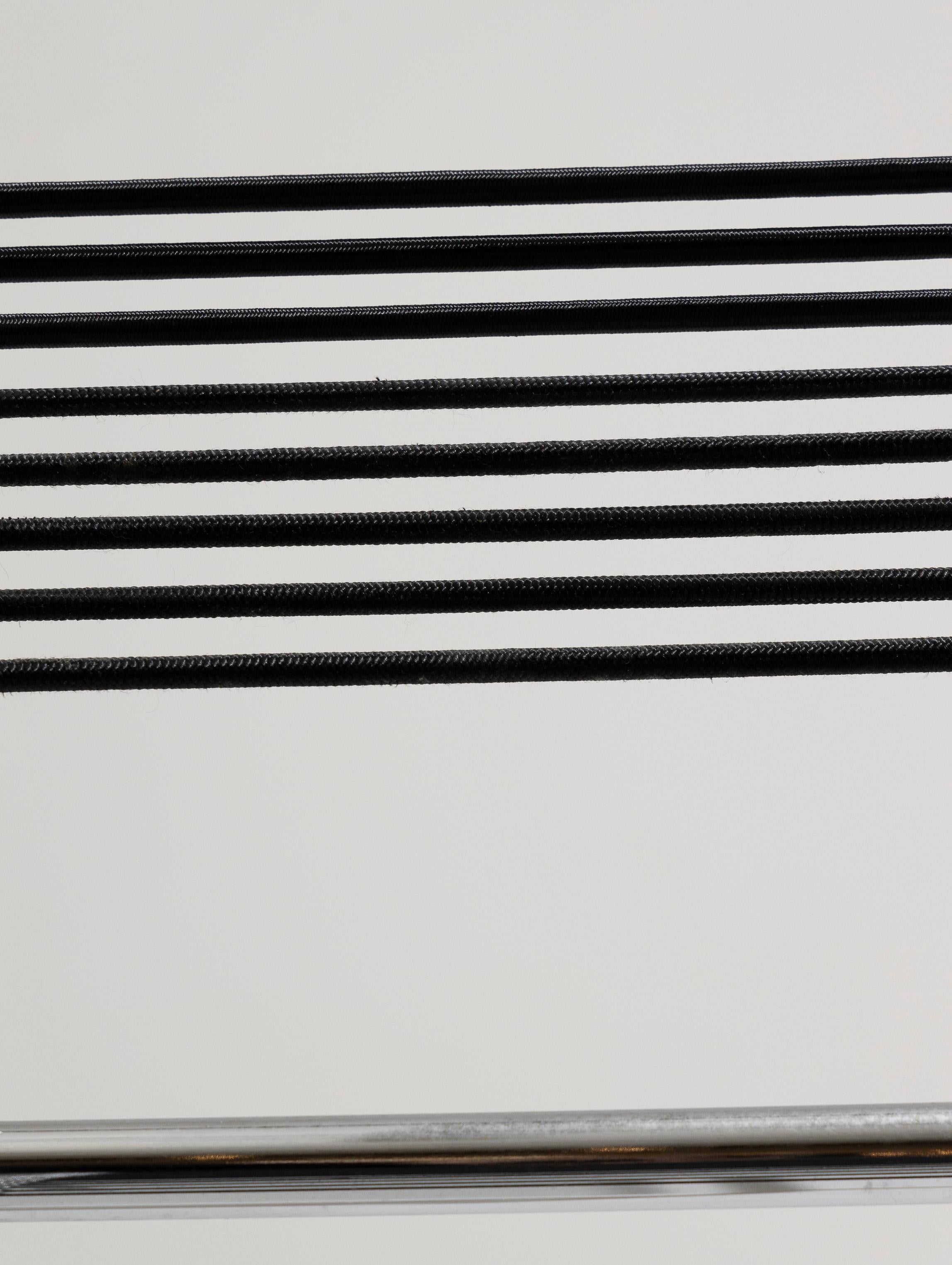 Set of six chairs in steel and elastic cord, René Herbst, 1970s 9