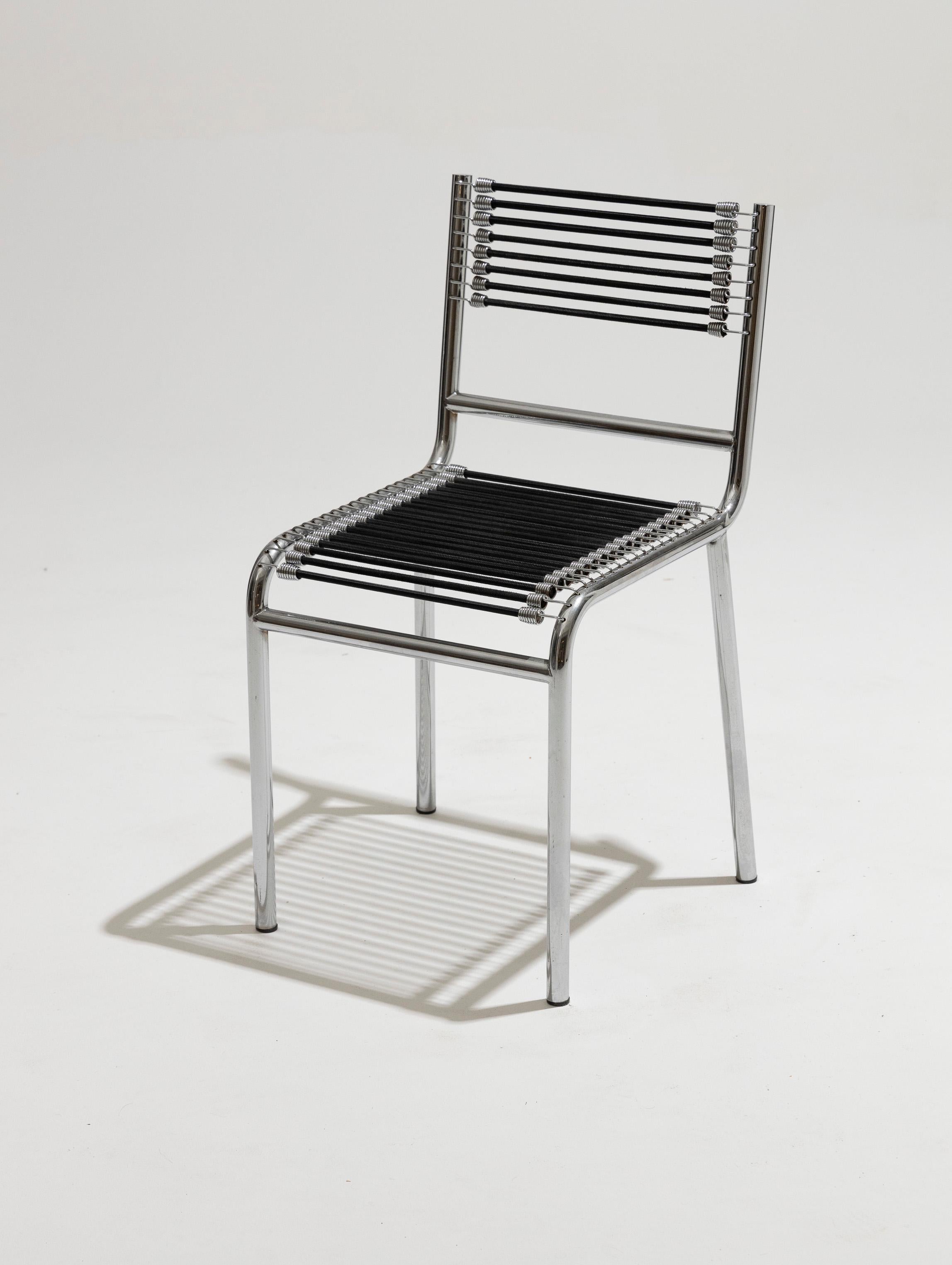 Set of six chairs in steel and elastic cord, René Herbst, 1970s In Good Condition In PARIS, FR