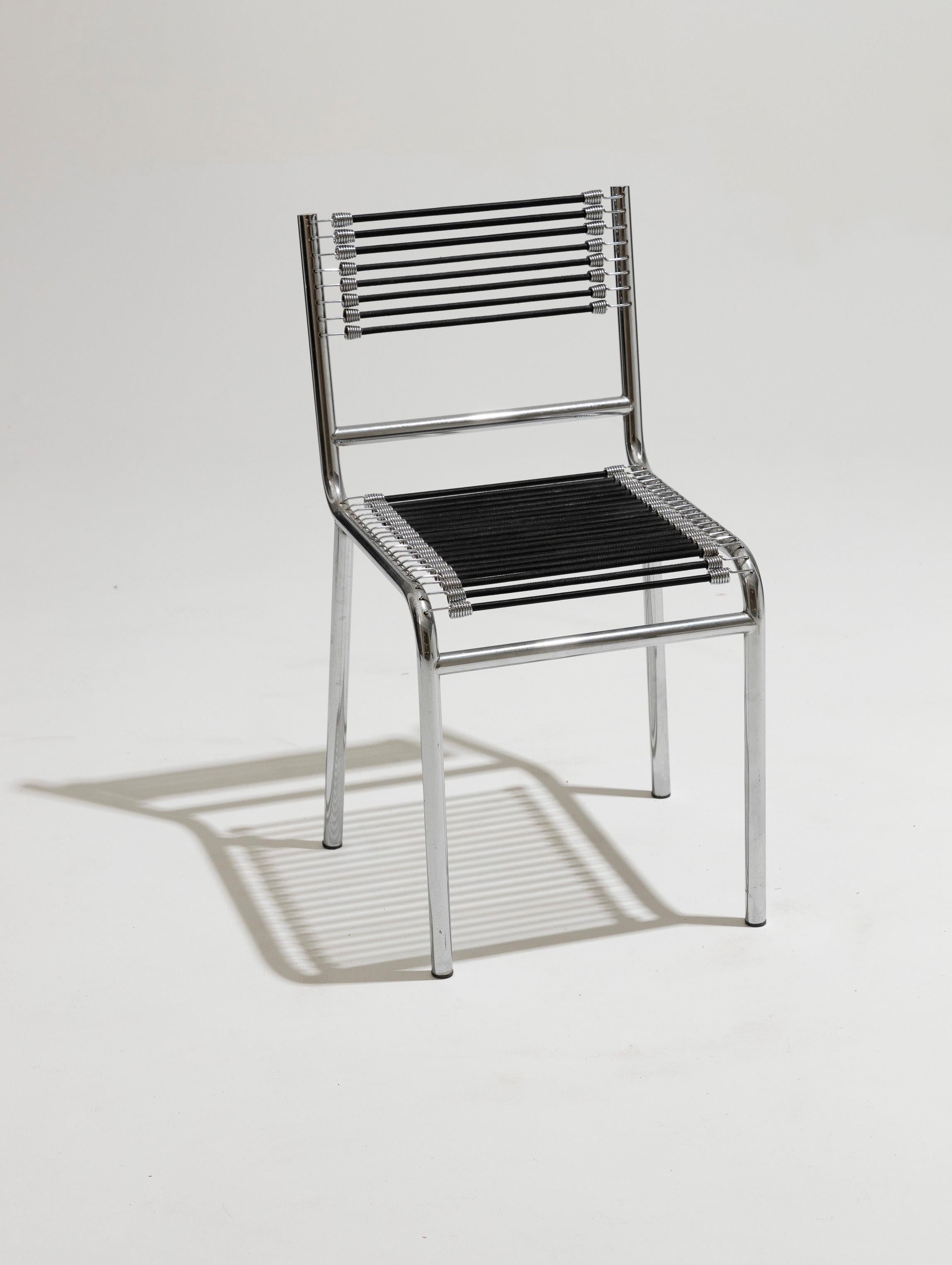 Set of six chairs in steel and elastic cord, René Herbst, 1970s 1