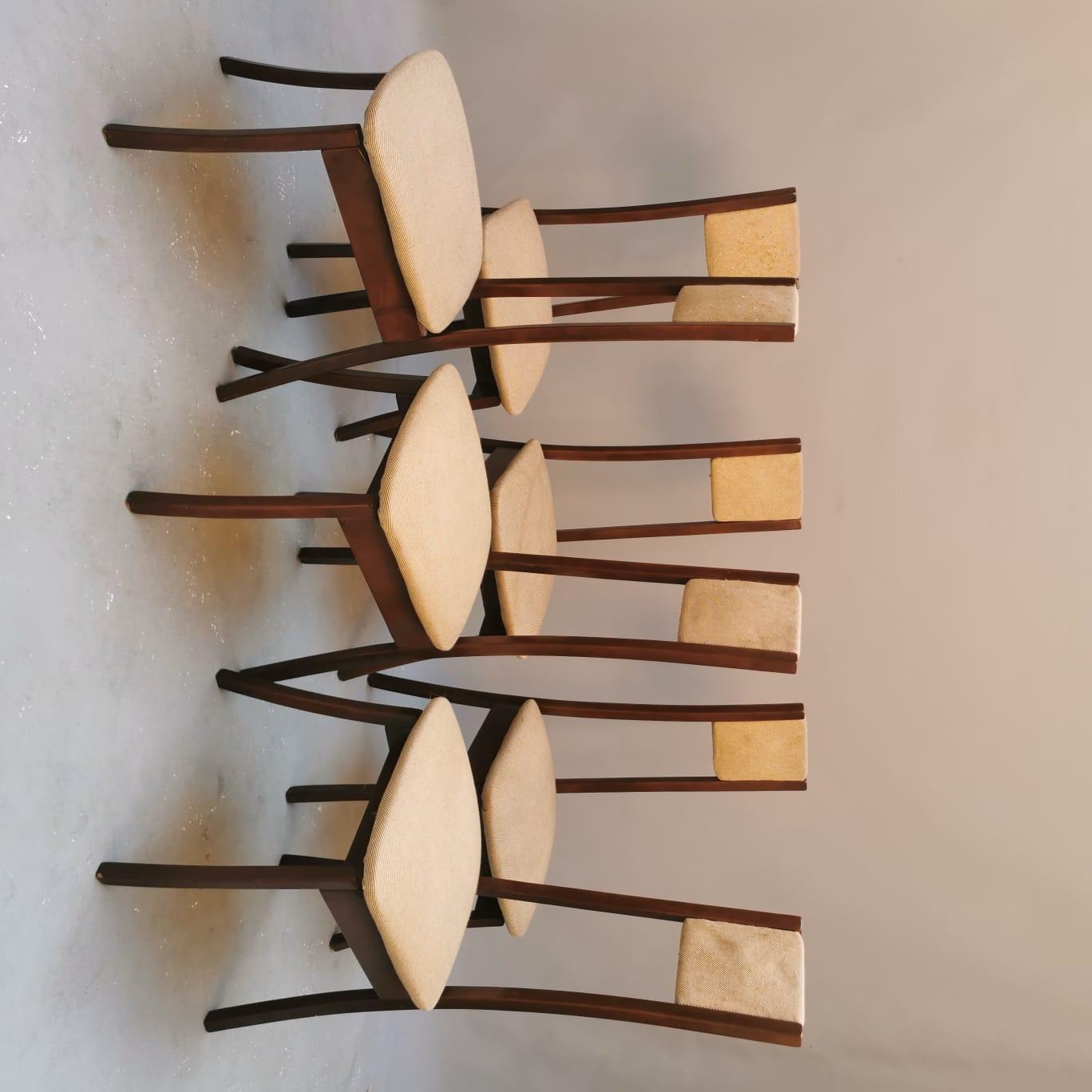 The set of six Angelo Mangiarotti Programma S11 chairs is a captivating blend of modernist design and functional elegance. These rare chairs, though requiring reupholstering, are in overall good condition, preserving their iconic silhouette and