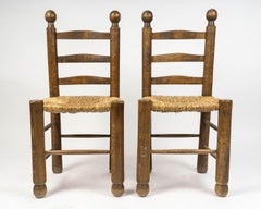 Set of Six Charles Dudouyt Dining Chairs in Wood and Cane, 20th Century.
