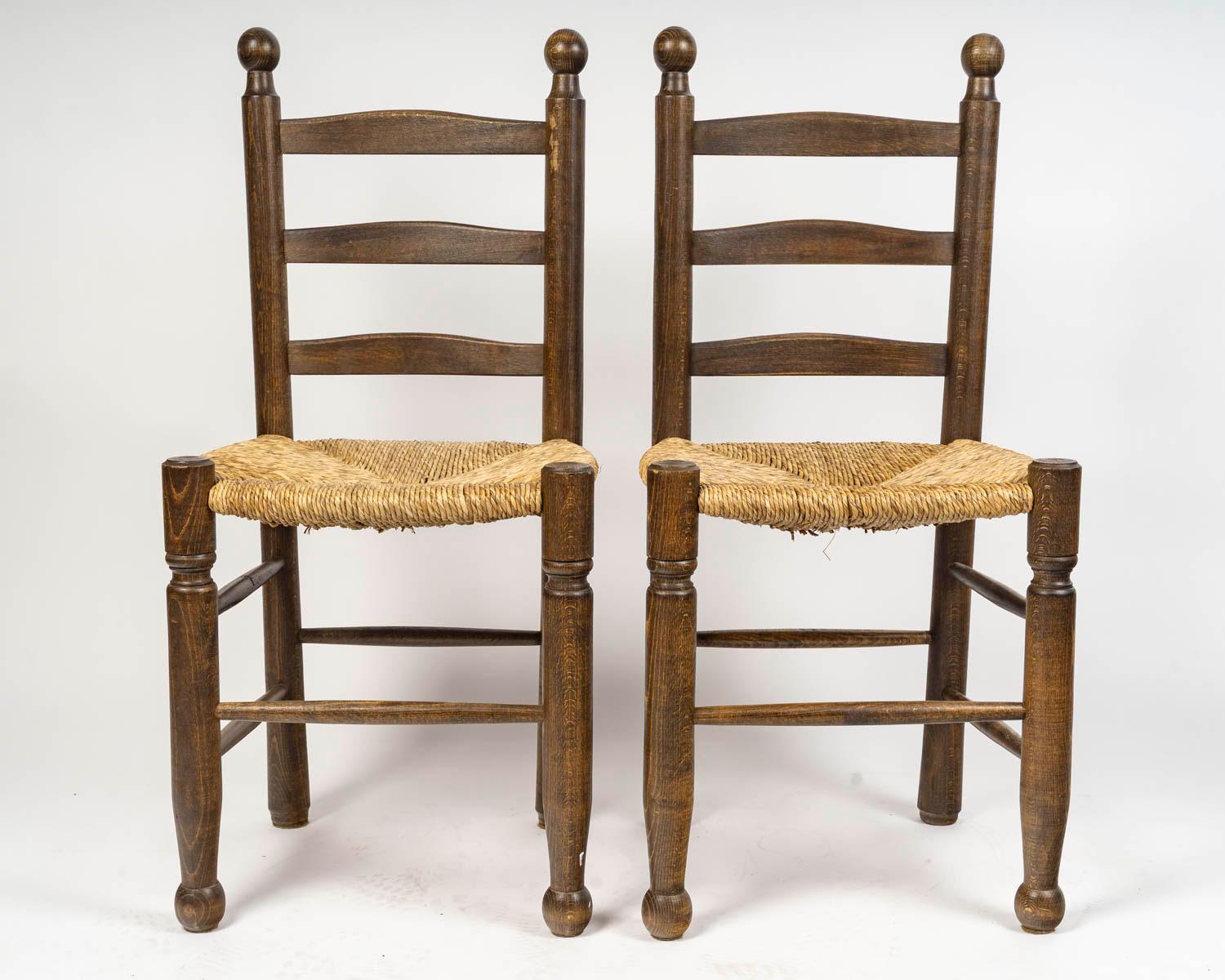 Art Deco Set of Six Charles Dudouyt Dining Chairs in Wood and Cane, 20th Century. For Sale