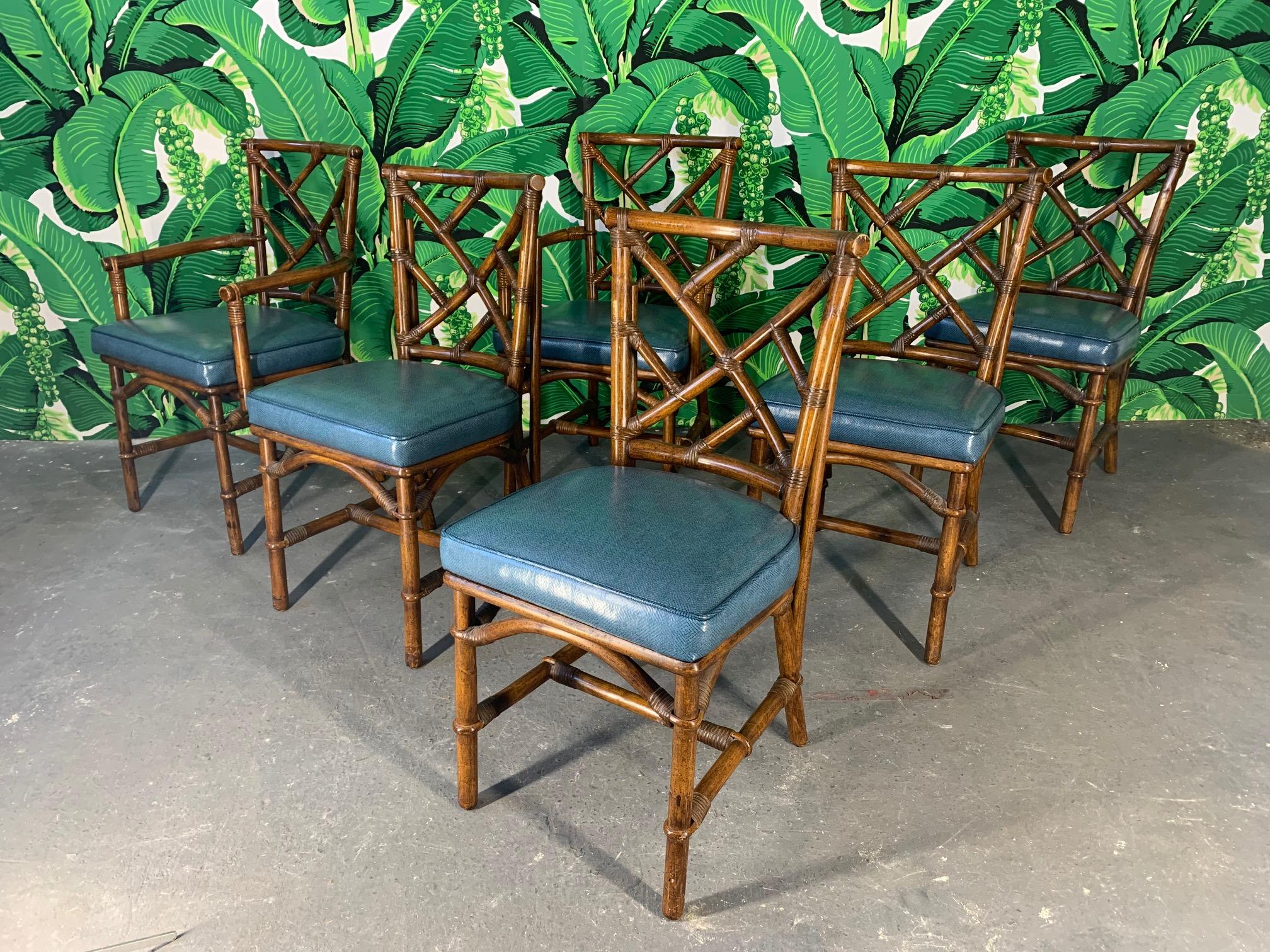 Set of 6 bamboo dining chairs in an Asian Chippendale pattern. 4 side chairs and 2 arm chairs. Very good vintage condition with minor imperfections consistent with age.